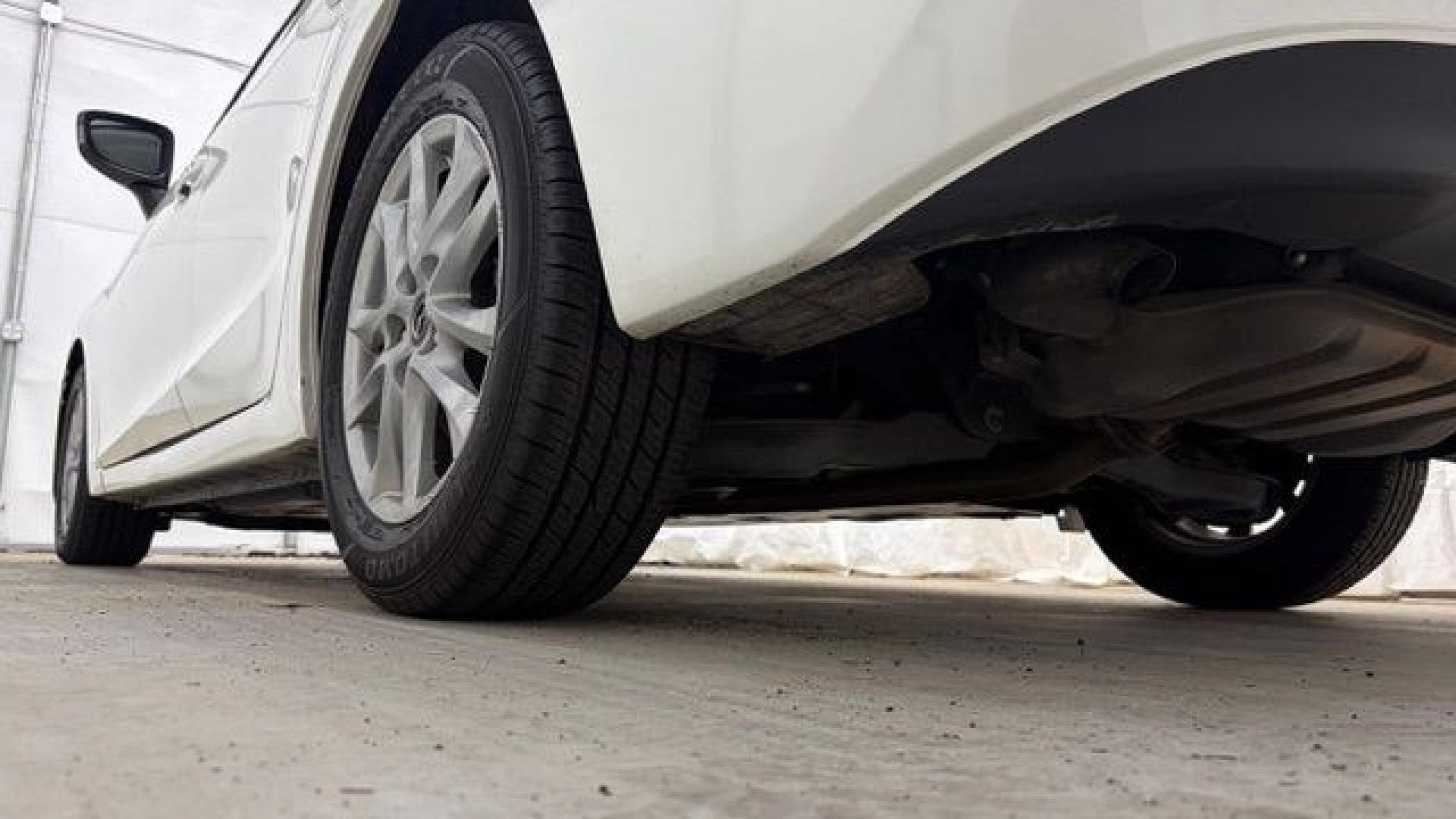 2014 White Mazda Mazda3 i Grand Touring (JM1BM1W75E1) with an SKYACTIV-G 2L I-4 gasoline direct injection engine, located at 1806 Veterans Memorial Hwy SW, Austell, GA, 30168, (770) 944-9558, 33.817959, -84.606987- Photo#20