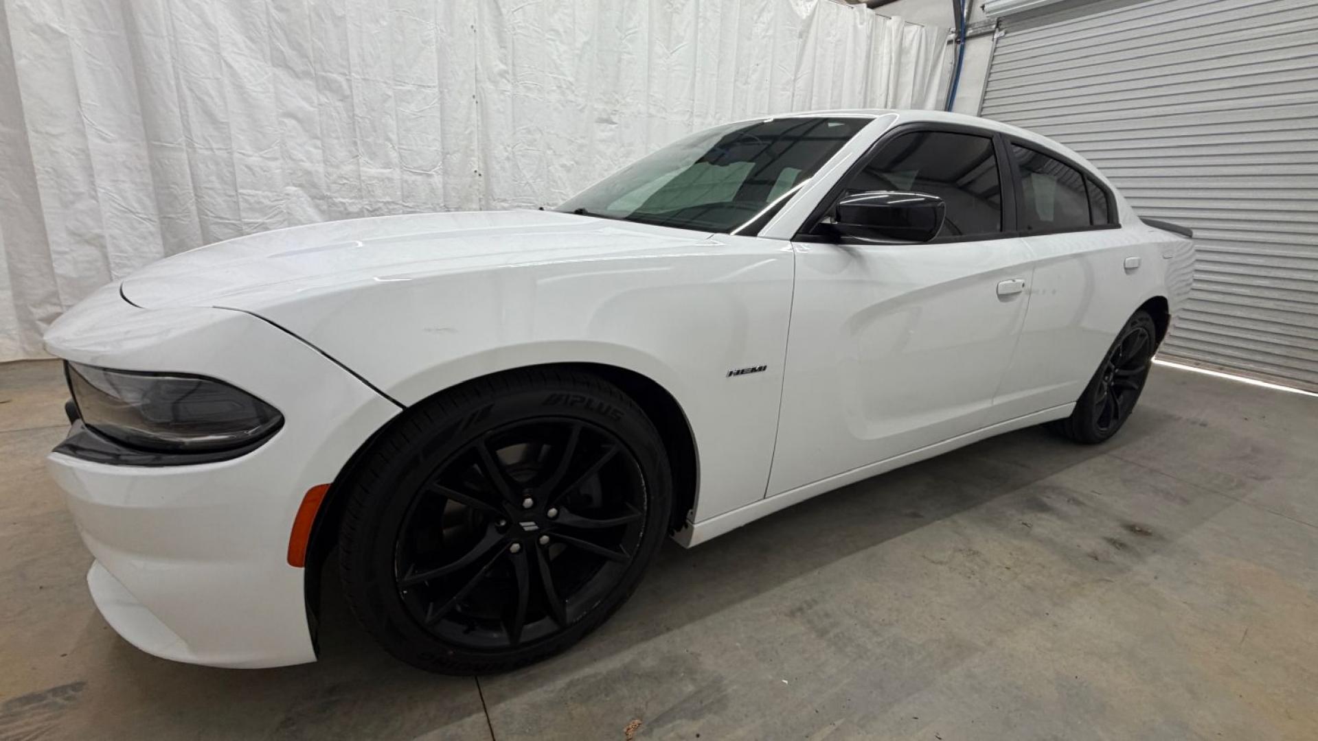 2017 White Dodge Charger R/T RWD (2C3CDXCT1HH) with an HEMI 5.7L V-8 regula engine, located at 1806 Veterans Memorial Hwy SW, Austell, GA, 30168, (770) 944-9558, 33.817959, -84.606987 - This Charger is in good condition and delivers real Hemi power, giving you the kind of performance and presence the Charger is known for. The tires are great, so there's no need to spend extra on replacements, and the paint is in good shape. Inside, the interior is impeccable and looks as good as it- Photo#1