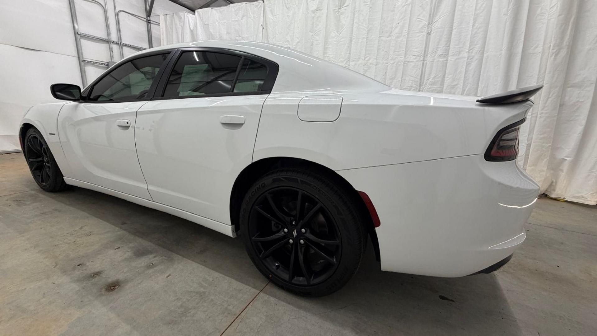 2017 White Dodge Charger R/T RWD (2C3CDXCT1HH) with an HEMI 5.7L V-8 regula engine, located at 1806 Veterans Memorial Hwy SW, Austell, GA, 30168, (770) 944-9558, 33.817959, -84.606987 - This Charger is in good condition and delivers real Hemi power, giving you the kind of performance and presence the Charger is known for. The tires are great, so there's no need to spend extra on replacements, and the paint is in good shape. Inside, the interior is impeccable and looks as good as it- Photo#2