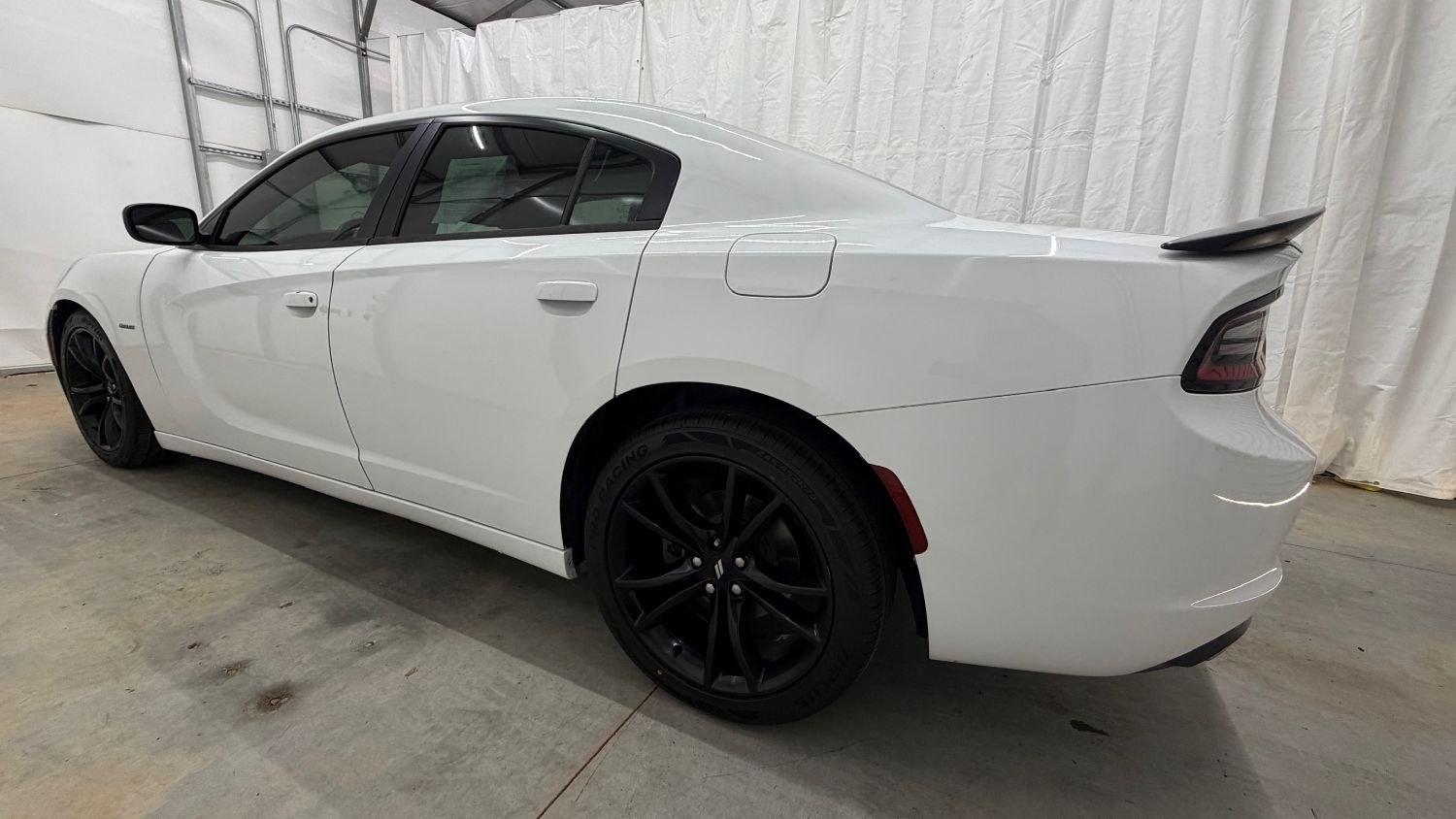 2017 White Dodge Charger R/T RWD (2C3CDXCT1HH) with an HEMI 5.7L V-8 regula engine, located at 1806 Veterans Memorial Hwy SW, Austell, GA, 30168, (770) 944-9558, 33.817959, -84.606987 - This 2017 Dodge Charger R/T delivers serious muscle-sedan performance wrapped in a clean White exterior. Under the hood is a powerful 370-hp 5.7L HEMI V8 paired with a smooth automatic transmission and rear-wheel drive, giving you the aggressive acceleration and confident handling the R/T trim is kn- Photo#2