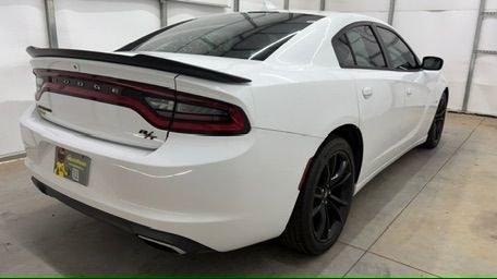 2017 White Dodge Charger R/T RWD (2C3CDXCT1HH) with an HEMI 5.7L V-8 regula engine, located at 1806 Veterans Memorial Hwy SW, Austell, GA, 30168, (770) 944-9558, 33.817959, -84.606987 - This 2017 Dodge Charger R/T delivers serious muscle-sedan performance wrapped in a clean White exterior. Under the hood is a powerful 370-hp 5.7L HEMI V8 paired with a smooth automatic transmission and rear-wheel drive, giving you the aggressive acceleration and confident handling the R/T trim is kn- Photo#5