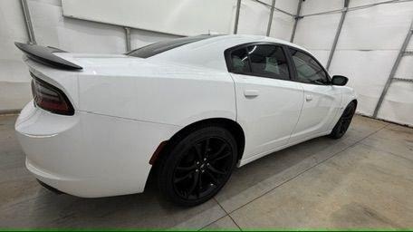2017 White Dodge Charger R/T RWD (2C3CDXCT1HH) with an HEMI 5.7L V-8 regula engine, located at 1806 Veterans Memorial Hwy SW, Austell, GA, 30168, (770) 944-9558, 33.817959, -84.606987 - This 2017 Dodge Charger R/T delivers serious muscle-sedan performance wrapped in a clean White exterior. Under the hood is a powerful 370-hp 5.7L HEMI V8 paired with a smooth automatic transmission and rear-wheel drive, giving you the aggressive acceleration and confident handling the R/T trim is kn- Photo#6