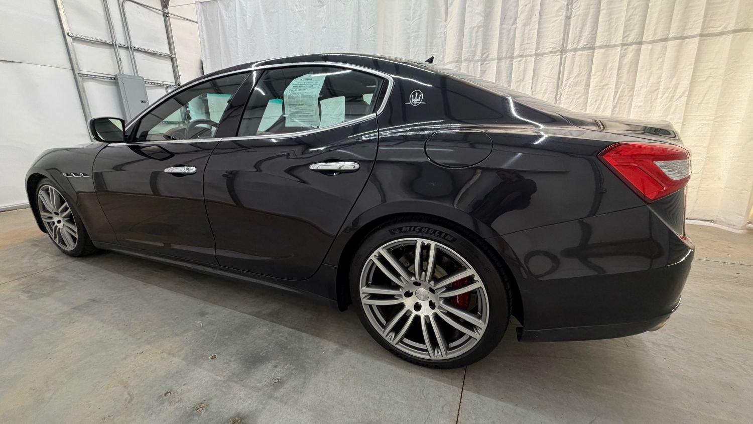 2015 Black Maserati Ghibli S Q4 (ZAM57RTA8F1) with an 3L V-6 gasoline direct injection engine, located at 1806 Veterans Memorial Hwy SW, Austell, GA, 30168, (770) 944-9558, 33.817959, -84.606987- Photo#2