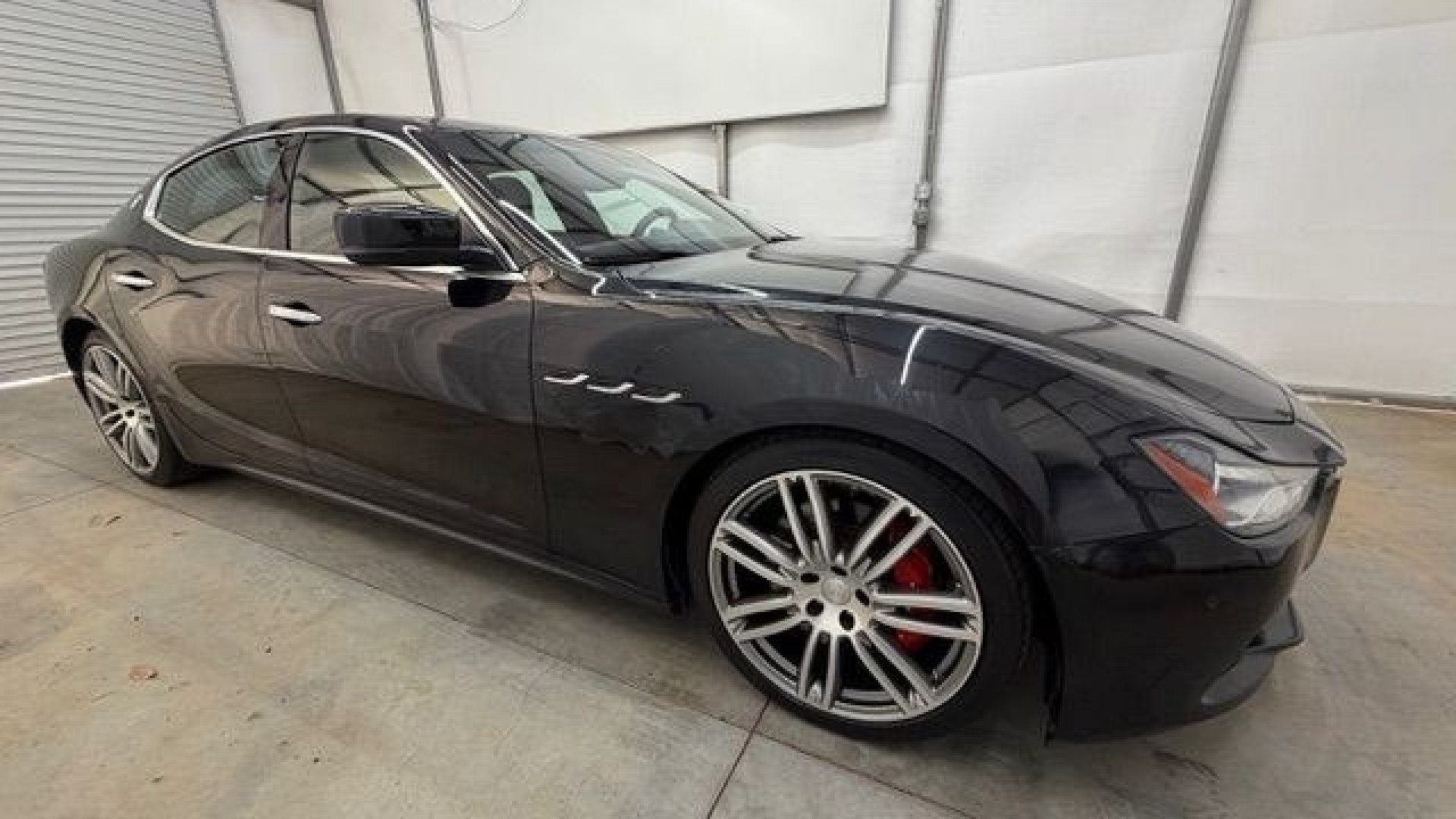 2015 Black Maserati Ghibli S Q4 (ZAM57RTA8F1) with an 3L V-6 gasoline direct injection engine, located at 1806 Veterans Memorial Hwy SW, Austell, GA, 30168, (770) 944-9558, 33.817959, -84.606987- Photo#7