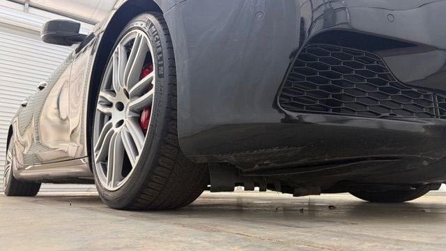 2015 Black Maserati Ghibli S Q4 (ZAM57RTA8F1) with an 3L V-6 gasoline direct injection engine, located at 1806 Veterans Memorial Hwy SW, Austell, GA, 30168, (770) 944-9558, 33.817959, -84.606987- Photo#18