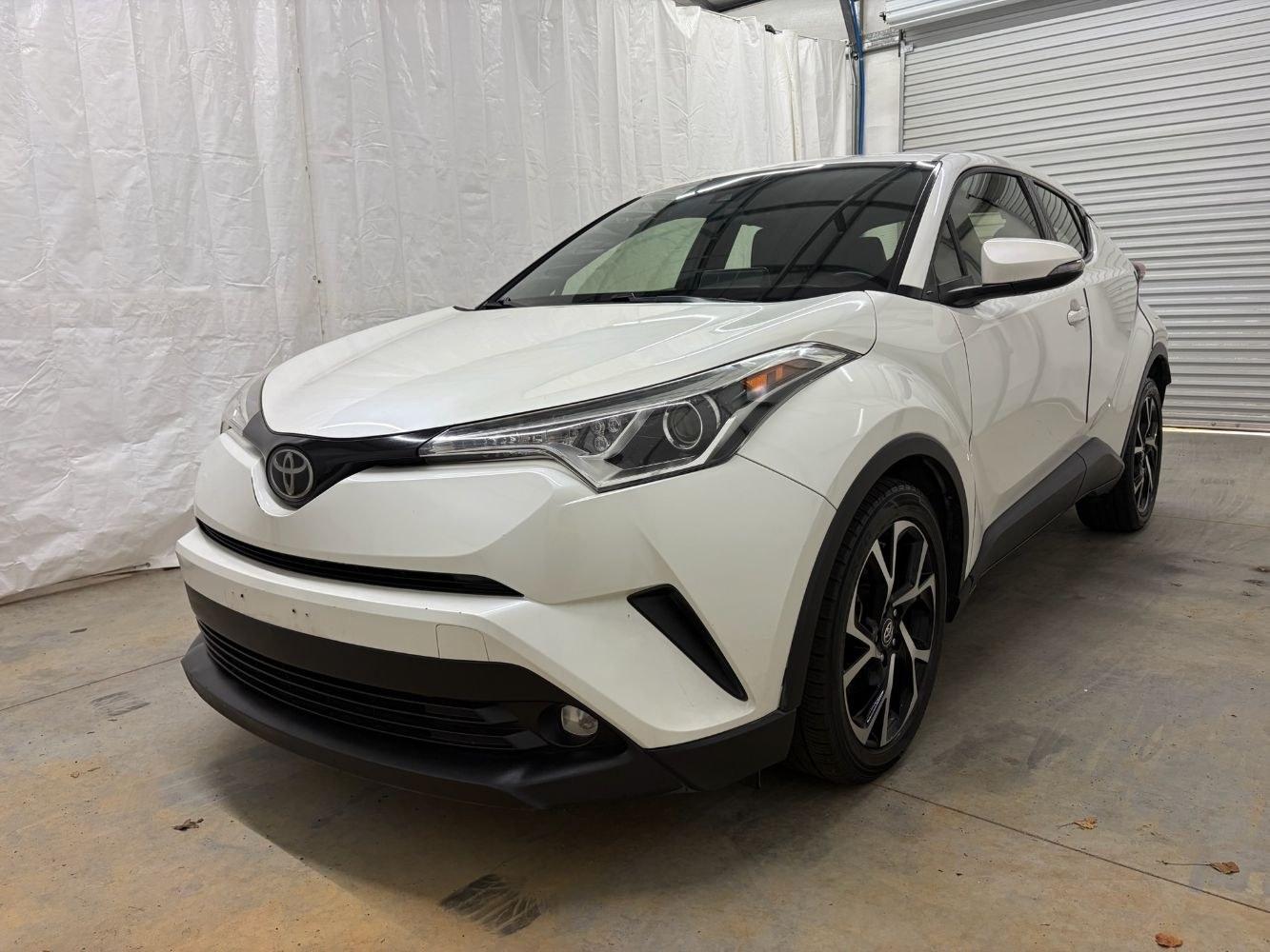 2019 White Toyota C-HR Limited (JTNKHMBX8K1) with an 2L I-4 DOHC engine, located at 1806 Veterans Memorial Hwy SW, Austell, GA, 30168, (770) 944-9558, 33.817959, -84.606987- Photo#0