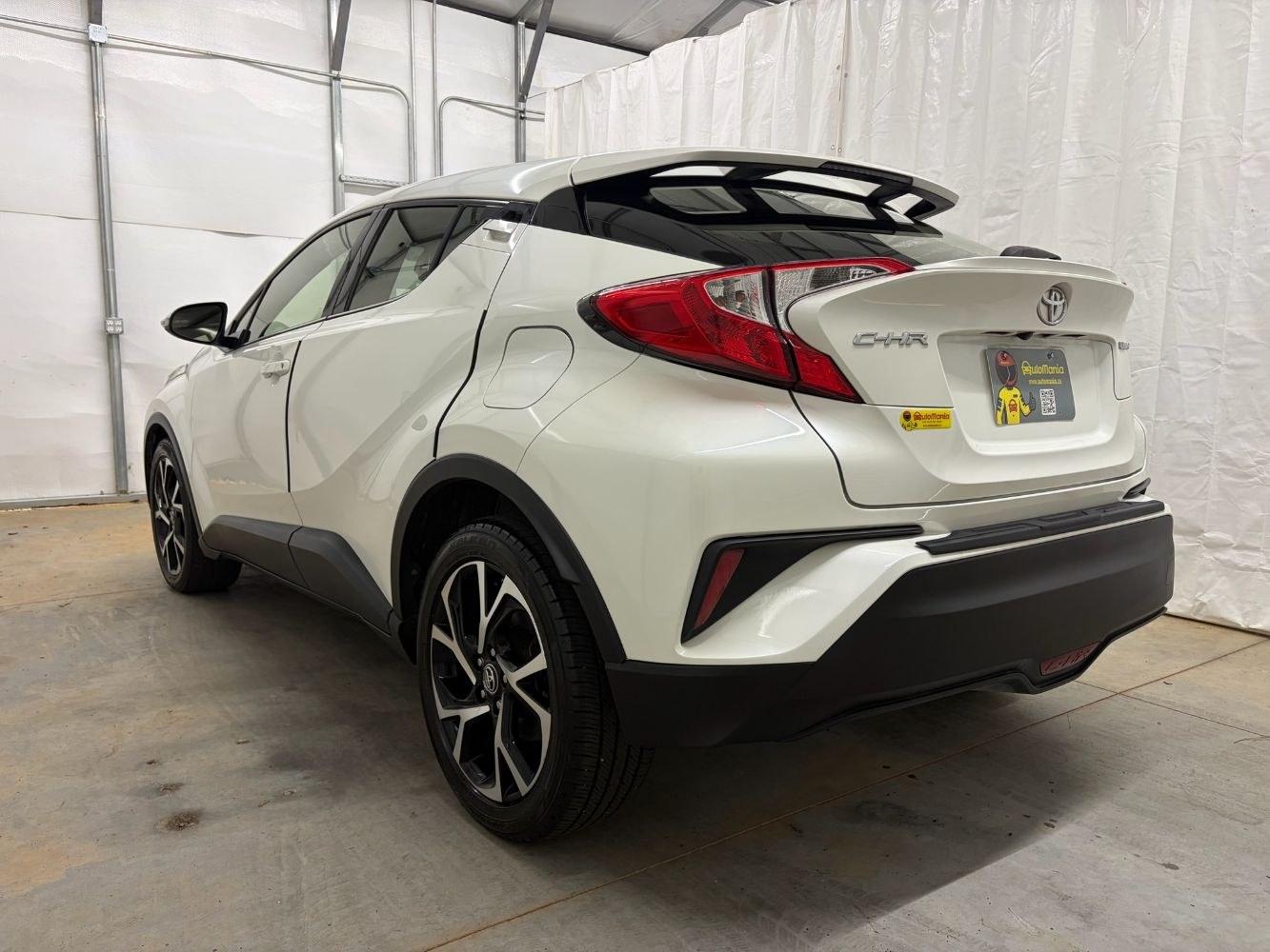 2019 White Toyota C-HR Limited (JTNKHMBX8K1) with an 2L I-4 DOHC engine, located at 1806 Veterans Memorial Hwy SW, Austell, GA, 30168, (770) 944-9558, 33.817959, -84.606987- Photo#3