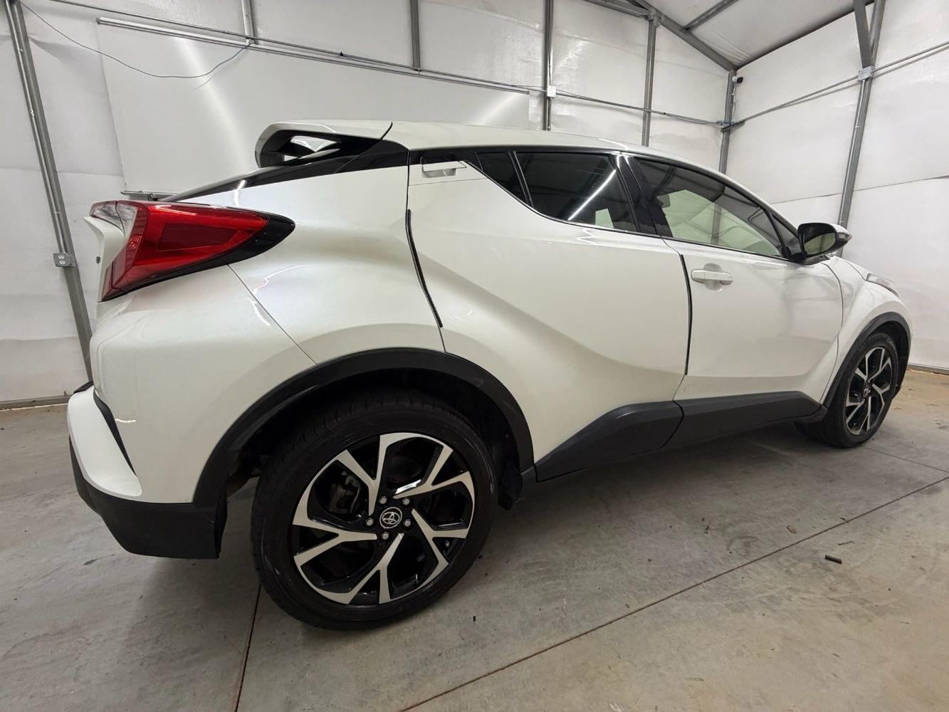 2019 White Toyota C-HR Limited (JTNKHMBX8K1) with an 2L I-4 DOHC engine, located at 1806 Veterans Memorial Hwy SW, Austell, GA, 30168, (770) 944-9558, 33.817959, -84.606987- Photo#6