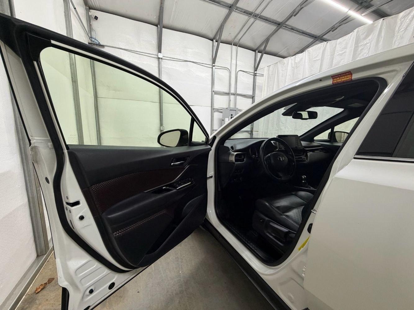 2019 White Toyota C-HR Limited (JTNKHMBX8K1) with an 2L I-4 DOHC engine, located at 1806 Veterans Memorial Hwy SW, Austell, GA, 30168, (770) 944-9558, 33.817959, -84.606987- Photo#10