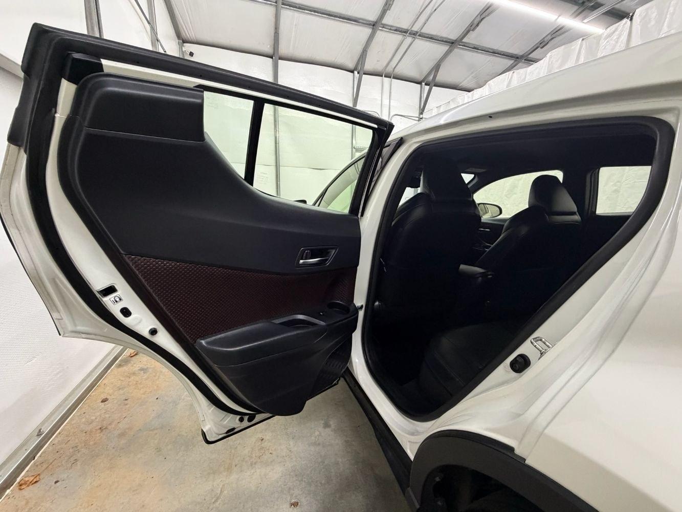 2019 White Toyota C-HR Limited (JTNKHMBX8K1) with an 2L I-4 DOHC engine, located at 1806 Veterans Memorial Hwy SW, Austell, GA, 30168, (770) 944-9558, 33.817959, -84.606987- Photo#12
