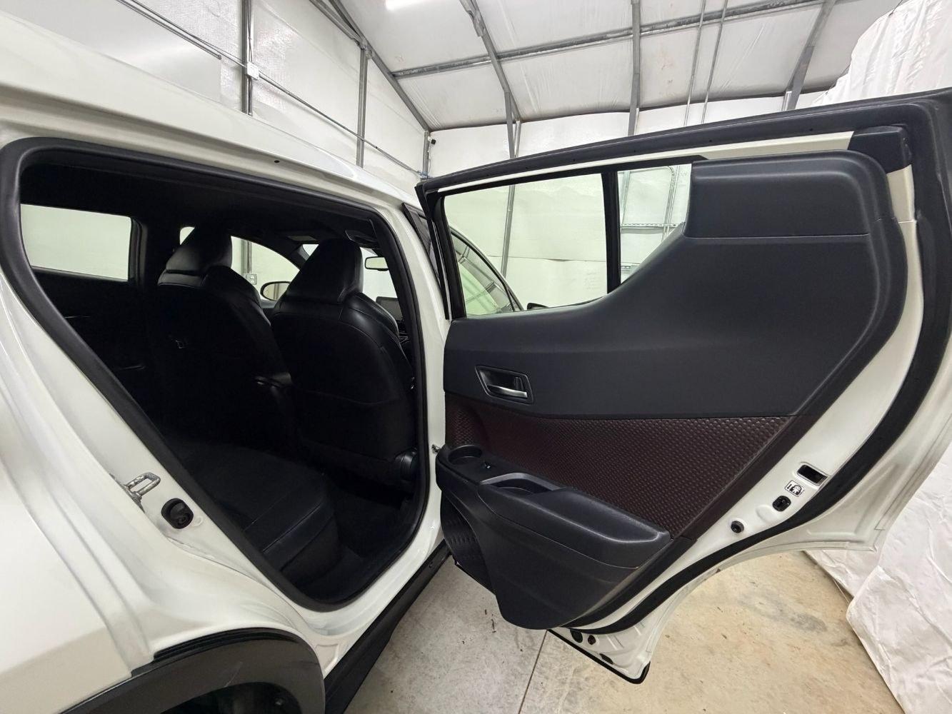 2019 White Toyota C-HR Limited (JTNKHMBX8K1) with an 2L I-4 DOHC engine, located at 1806 Veterans Memorial Hwy SW, Austell, GA, 30168, (770) 944-9558, 33.817959, -84.606987- Photo#14