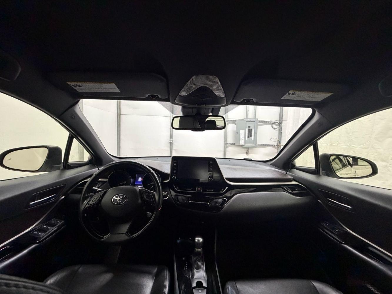 2019 White Toyota C-HR Limited (JTNKHMBX8K1) with an 2L I-4 DOHC engine, located at 1806 Veterans Memorial Hwy SW, Austell, GA, 30168, (770) 944-9558, 33.817959, -84.606987- Photo#18