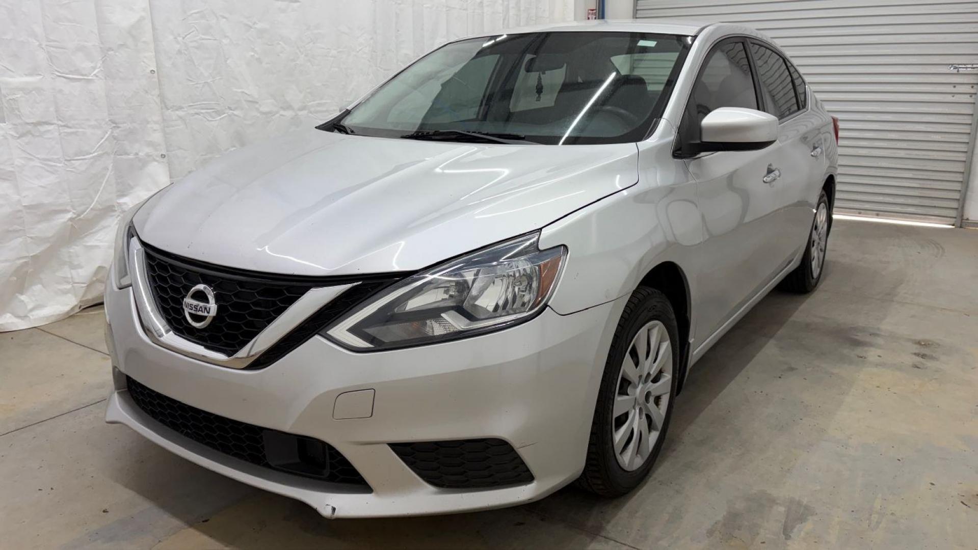 2018 Silver Nissan Sentra S (3N1AB7AP7JY) with an 1.8L I-4 DOHC engine, located at 1806 Veterans Memorial Hwy SW, Austell, GA, 30168, (770) 944-9558, 33.817959, -84.606987- Photo#0