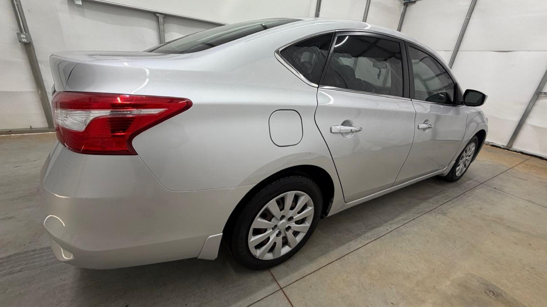 2018 Silver Nissan Sentra S (3N1AB7AP7JY) with an 1.8L I-4 DOHC engine, located at 1806 Veterans Memorial Hwy SW, Austell, GA, 30168, (770) 944-9558, 33.817959, -84.606987- Photo#6