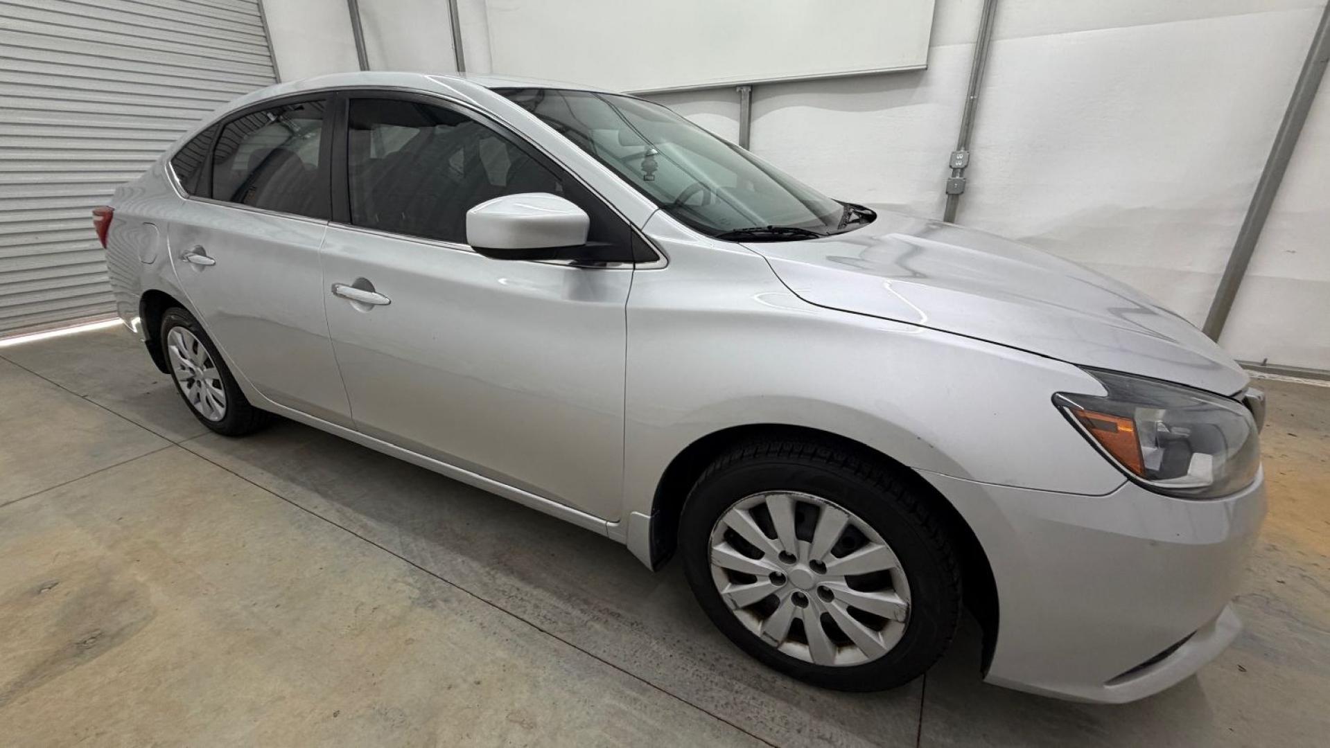 2018 Silver Nissan Sentra S (3N1AB7AP7JY) with an 1.8L I-4 DOHC engine, located at 1806 Veterans Memorial Hwy SW, Austell, GA, 30168, (770) 944-9558, 33.817959, -84.606987- Photo#7