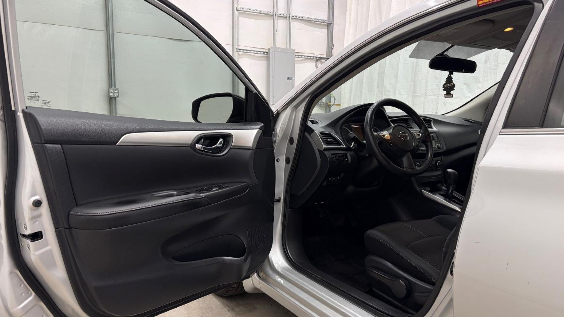 2018 Silver Nissan Sentra S (3N1AB7AP7JY) with an 1.8L I-4 DOHC engine, located at 1806 Veterans Memorial Hwy SW, Austell, GA, 30168, (770) 944-9558, 33.817959, -84.606987- Photo#10