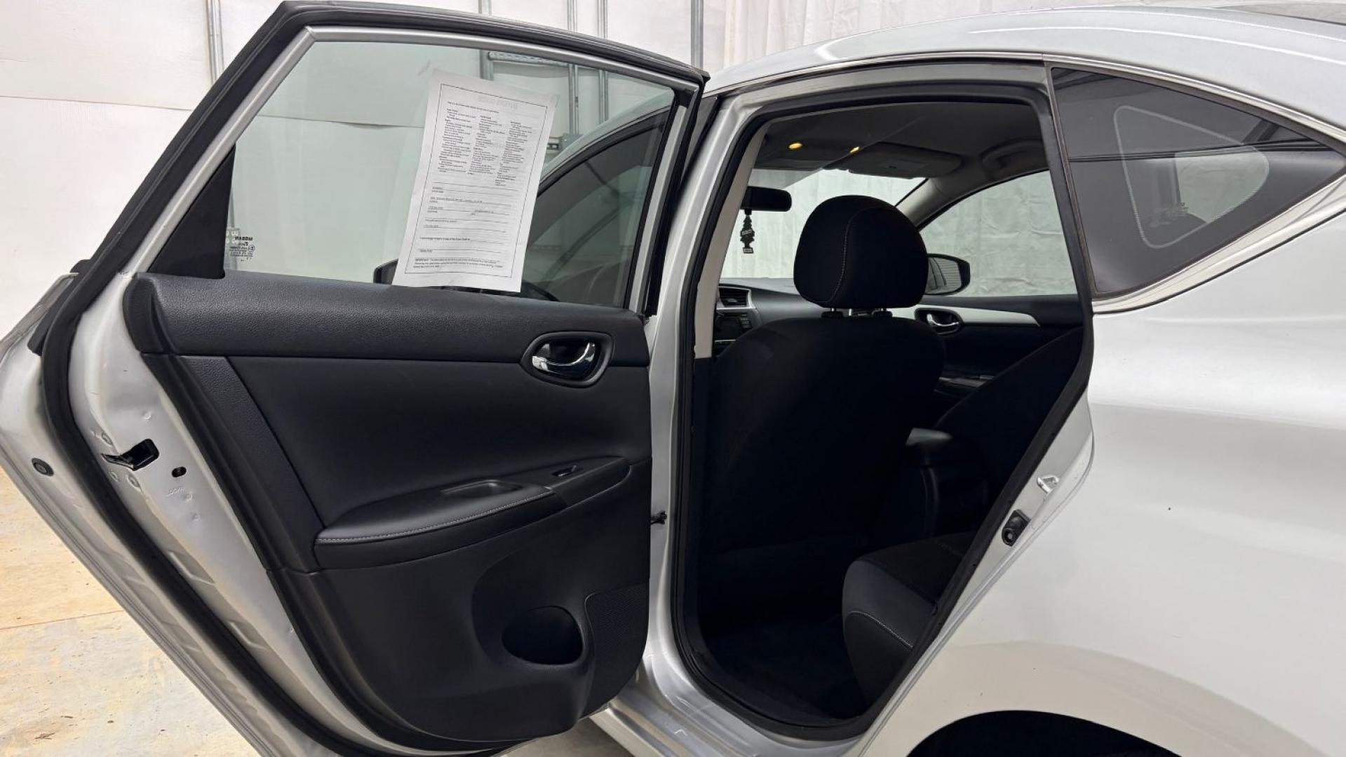2018 Silver Nissan Sentra S (3N1AB7AP7JY) with an 1.8L I-4 DOHC engine, located at 1806 Veterans Memorial Hwy SW, Austell, GA, 30168, (770) 944-9558, 33.817959, -84.606987- Photo#13
