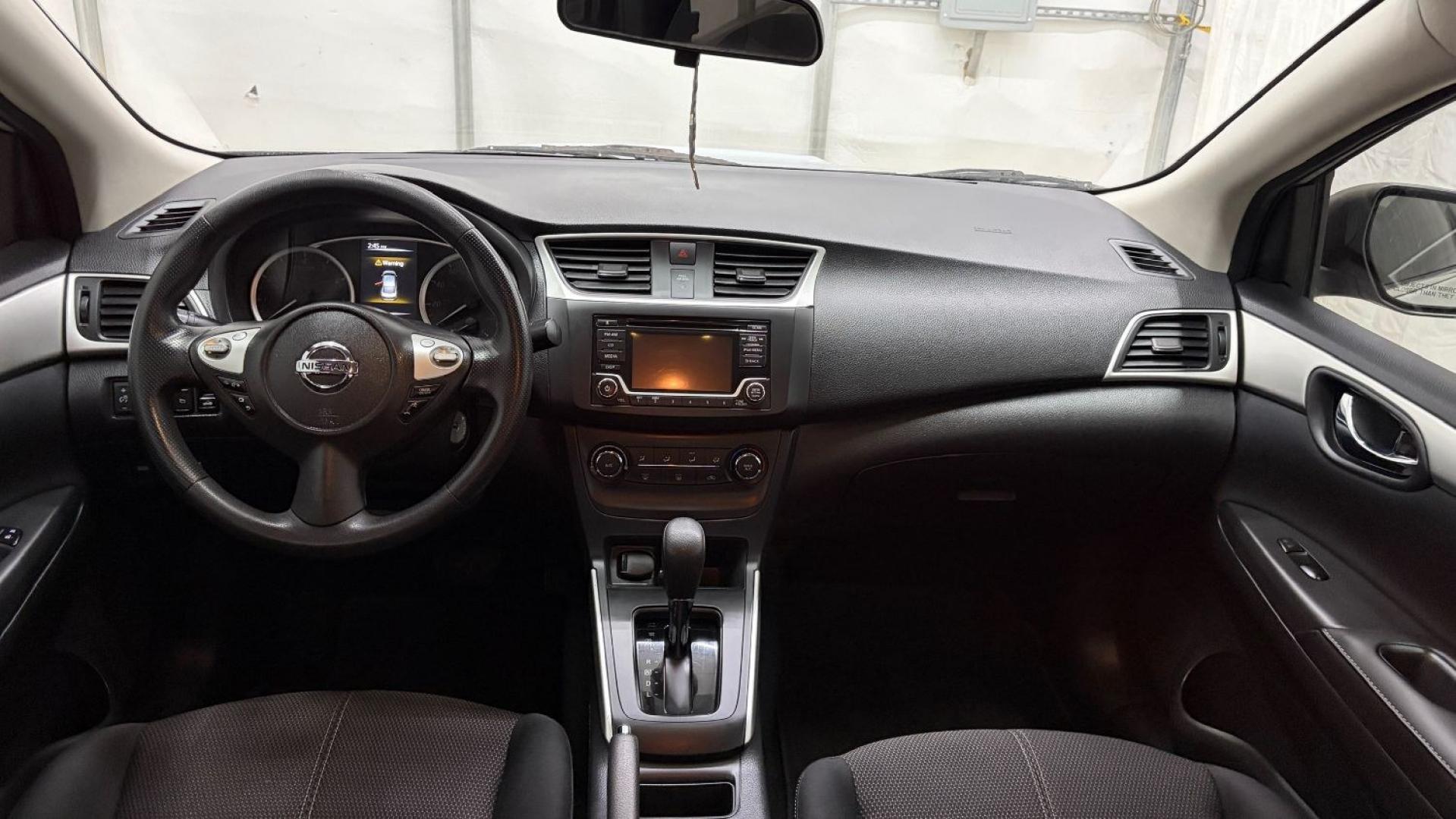 2018 Silver Nissan Sentra S (3N1AB7AP7JY) with an 1.8L I-4 DOHC engine, located at 1806 Veterans Memorial Hwy SW, Austell, GA, 30168, (770) 944-9558, 33.817959, -84.606987- Photo#15