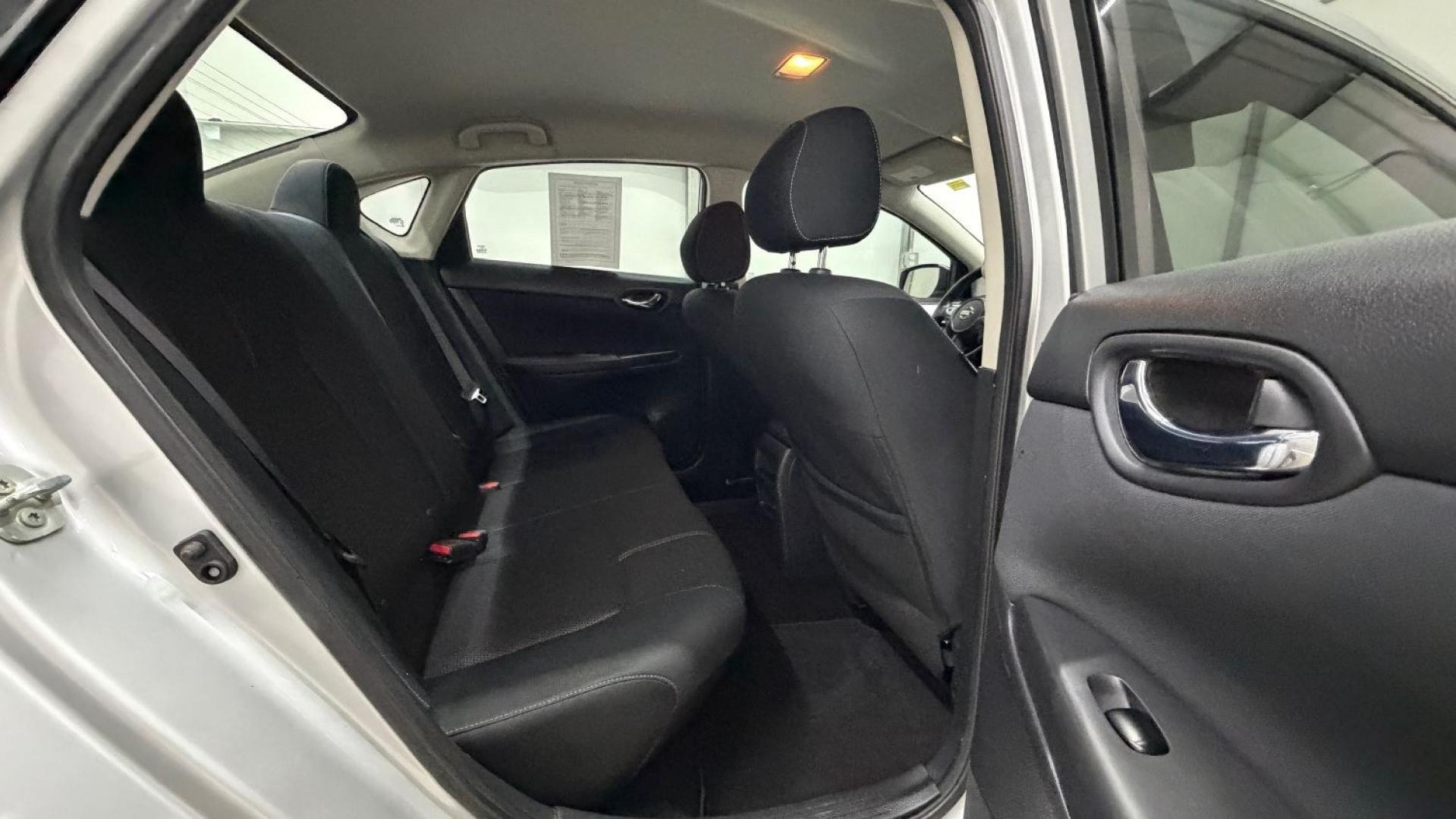 2018 Silver Nissan Sentra S (3N1AB7AP7JY) with an 1.8L I-4 DOHC engine, located at 1806 Veterans Memorial Hwy SW, Austell, GA, 30168, (770) 944-9558, 33.817959, -84.606987- Photo#16