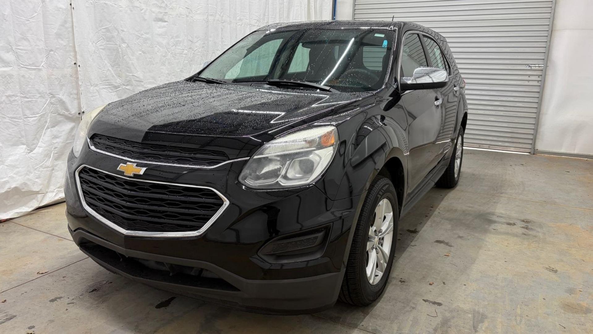 2016 Black Chevrolet Equinox LS (2GNALBEKXG1) with an ECOTEC 2.4L I-4 gasoline direct injection engine, located at 1806 Veterans Memorial Hwy SW, Austell, GA, 30168, (770) 944-9558, 33.817959, -84.606987- Photo#0