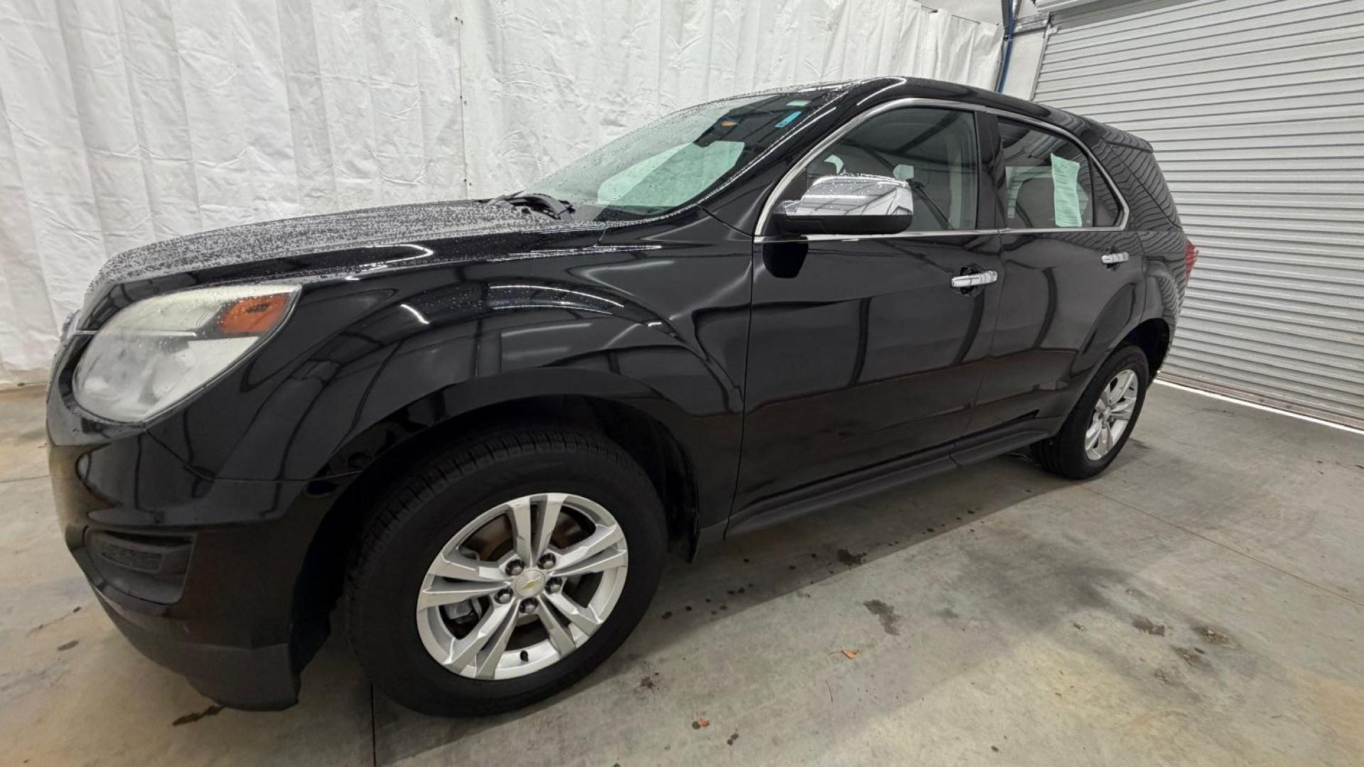 2016 Black Chevrolet Equinox LS (2GNALBEKXG1) with an ECOTEC 2.4L I-4 gasoline direct injection engine, located at 1806 Veterans Memorial Hwy SW, Austell, GA, 30168, (770) 944-9558, 33.817959, -84.606987- Photo#1