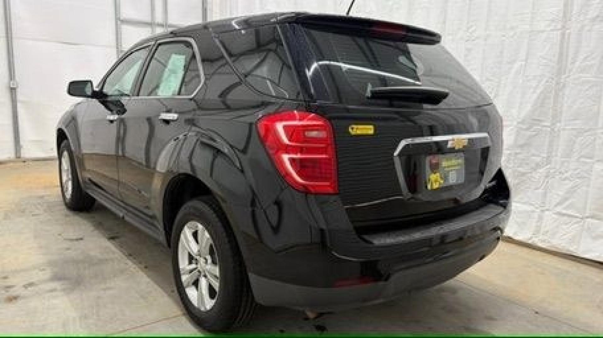 2016 Black Chevrolet Equinox LS (2GNALBEKXG1) with an ECOTEC 2.4L I-4 gasoline direct injection engine, located at 1806 Veterans Memorial Hwy SW, Austell, GA, 30168, (770) 944-9558, 33.817959, -84.606987- Photo#3