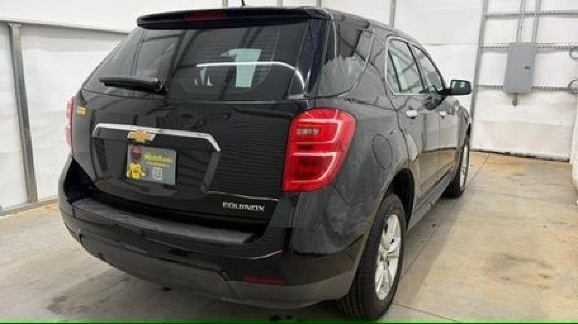 2016 Black Chevrolet Equinox LS (2GNALBEKXG1) with an ECOTEC 2.4L I-4 gasoline direct injection engine, located at 1806 Veterans Memorial Hwy SW, Austell, GA, 30168, (770) 944-9558, 33.817959, -84.606987- Photo#5