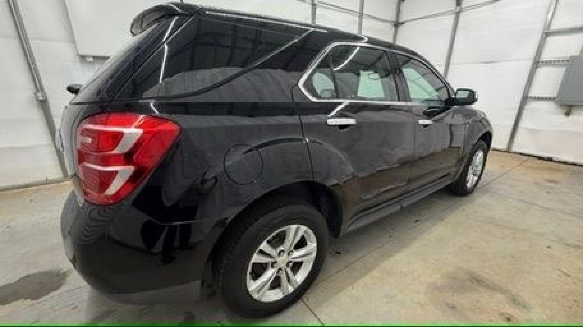 2016 Black Chevrolet Equinox LS (2GNALBEKXG1) with an ECOTEC 2.4L I-4 gasoline direct injection engine, located at 1806 Veterans Memorial Hwy SW, Austell, GA, 30168, (770) 944-9558, 33.817959, -84.606987- Photo#6