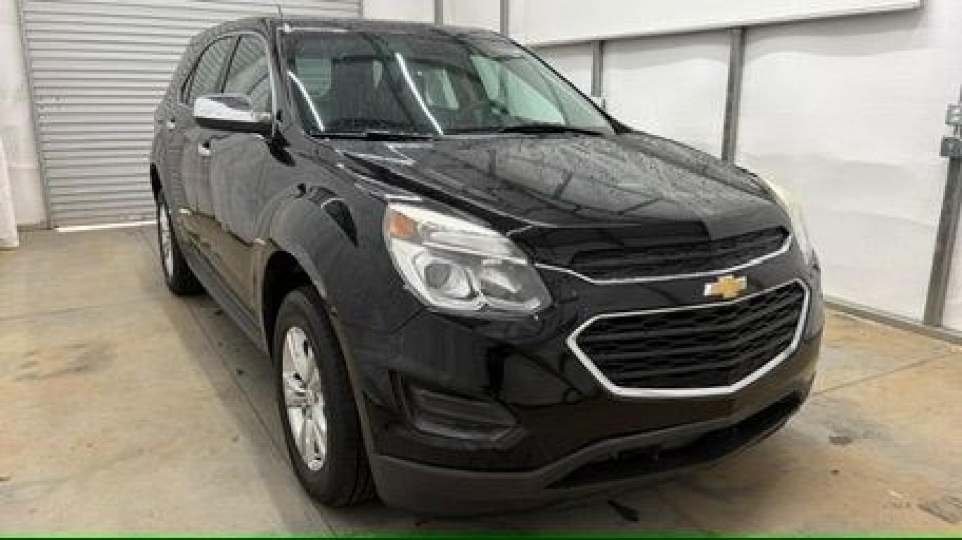2016 Black Chevrolet Equinox LS (2GNALBEKXG1) with an ECOTEC 2.4L I-4 gasoline direct injection engine, located at 1806 Veterans Memorial Hwy SW, Austell, GA, 30168, (770) 944-9558, 33.817959, -84.606987- Photo#8
