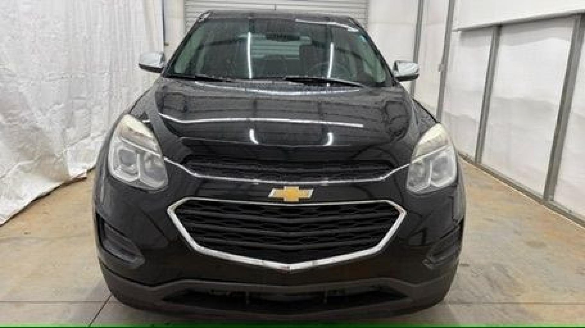 2016 Black Chevrolet Equinox LS (2GNALBEKXG1) with an ECOTEC 2.4L I-4 gasoline direct injection engine, located at 1806 Veterans Memorial Hwy SW, Austell, GA, 30168, (770) 944-9558, 33.817959, -84.606987- Photo#9