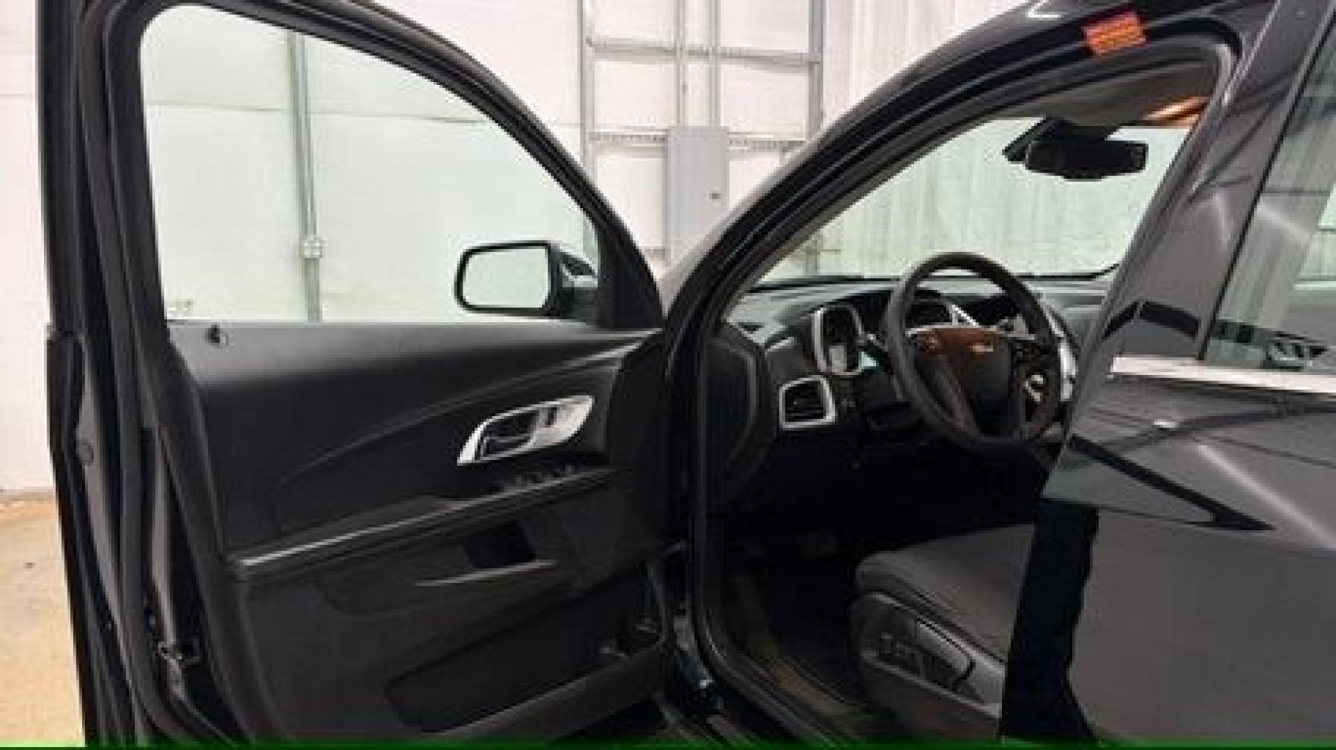 2016 Black Chevrolet Equinox LS (2GNALBEKXG1) with an ECOTEC 2.4L I-4 gasoline direct injection engine, located at 1806 Veterans Memorial Hwy SW, Austell, GA, 30168, (770) 944-9558, 33.817959, -84.606987- Photo#10