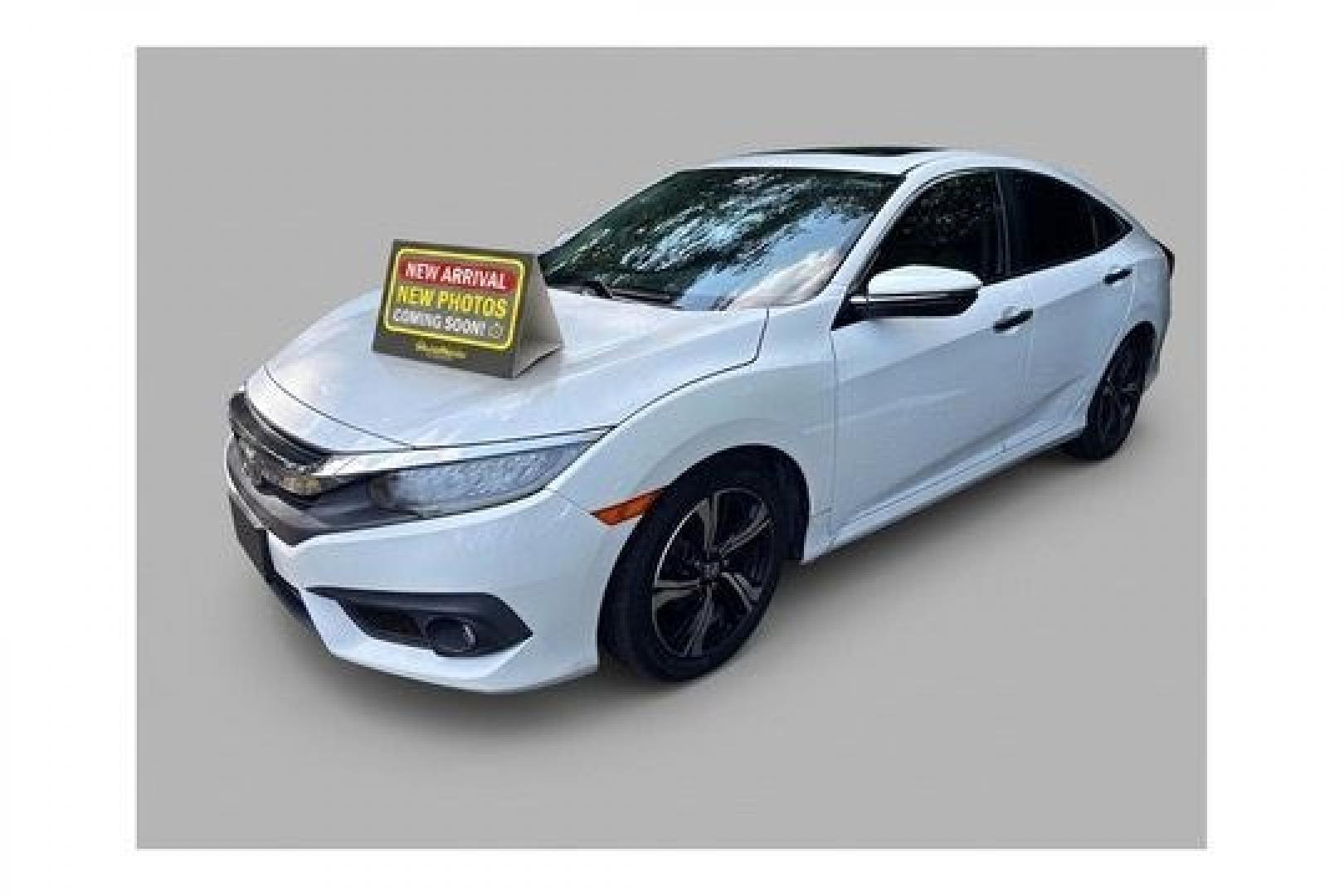 2016 White Honda Civic Touring (2HGFC1F93GH) with an 1.5L I-4 gasoline direct injection engine, located at 1806 Veterans Memorial Hwy SW, Austell, GA, 30168, (770) 944-9558, 33.817959, -84.606987- Photo#0