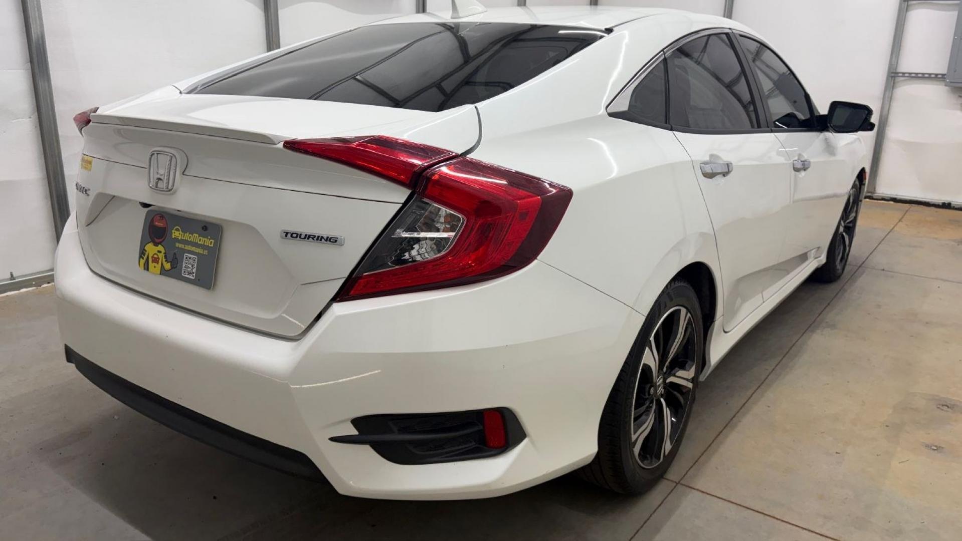 2016 White Honda Civic Touring (2HGFC1F93GH) with an 1.5L I-4 gasoline direct injection engine, located at 1806 Veterans Memorial Hwy SW, Austell, GA, 30168, (770) 944-9558, 33.817959, -84.606987- Photo#6