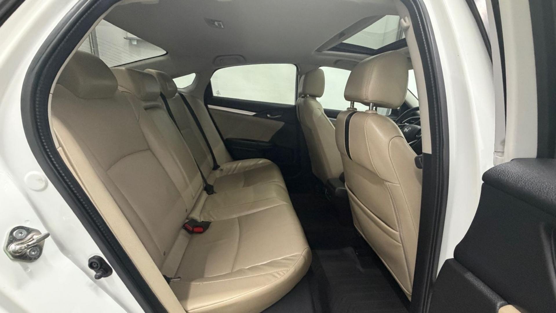 2016 White Honda Civic Touring (2HGFC1F93GH) with an 1.5L I-4 gasoline direct injection engine, located at 1806 Veterans Memorial Hwy SW, Austell, GA, 30168, (770) 944-9558, 33.817959, -84.606987- Photo#19