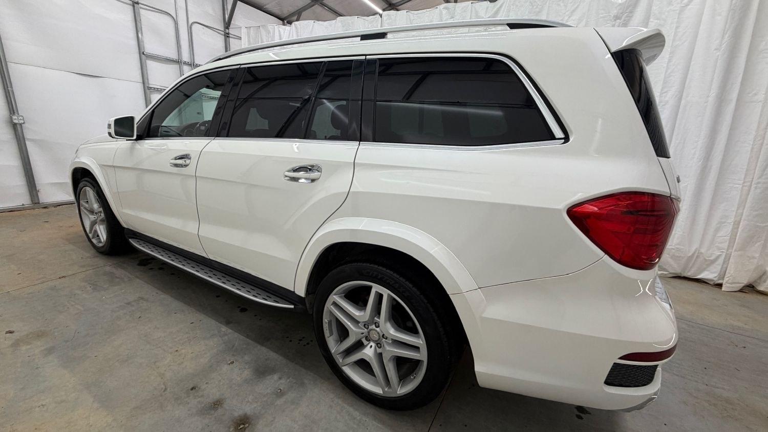 2016 White Mercedes-Benz GL 550 4MATIC (4JGDF7DE8GA) with an 4.7L V-8 gasoline direct injection engine, located at 1806 Veterans Memorial Hwy SW, Austell, GA, 30168, (770) 944-9558, 33.817959, -84.606987 - Why Choose Automania? At Automania, we make car buying easy and stress-free, with over 20 years serving Austell, GA and the surrounding communities. WE FINANCE GOOD AND NOT SO GOOD CREDIT, we work with all credit types, and every vehicle comes with a free vehicle history report so you know its backg- Photo#2