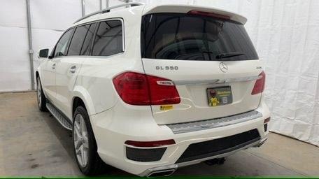 2016 White Mercedes-Benz GL 550 4MATIC (4JGDF7DE8GA) with an 4.7L V-8 gasoline direct injection engine, located at 1806 Veterans Memorial Hwy SW, Austell, GA, 30168, (770) 944-9558, 33.817959, -84.606987 - Why Choose Automania? At Automania, we make car buying easy and stress-free, with over 20 years serving Austell, GA and the surrounding communities. WE FINANCE GOOD AND NOT SO GOOD CREDIT, we work with all credit types, and every vehicle comes with a free vehicle history report so you know its backg- Photo#3