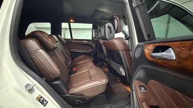 2016 White Mercedes-Benz GL 550 4MATIC (4JGDF7DE8GA) with an 4.7L V-8 gasoline direct injection engine, located at 1806 Veterans Memorial Hwy SW, Austell, GA, 30168, (770) 944-9558, 33.817959, -84.606987 - Why Choose Automania? At Automania, we make car buying easy and stress-free, with over 20 years serving Austell, GA and the surrounding communities. WE FINANCE GOOD AND NOT SO GOOD CREDIT, we work with all credit types, and every vehicle comes with a free vehicle history report so you know its backg- Photo#18