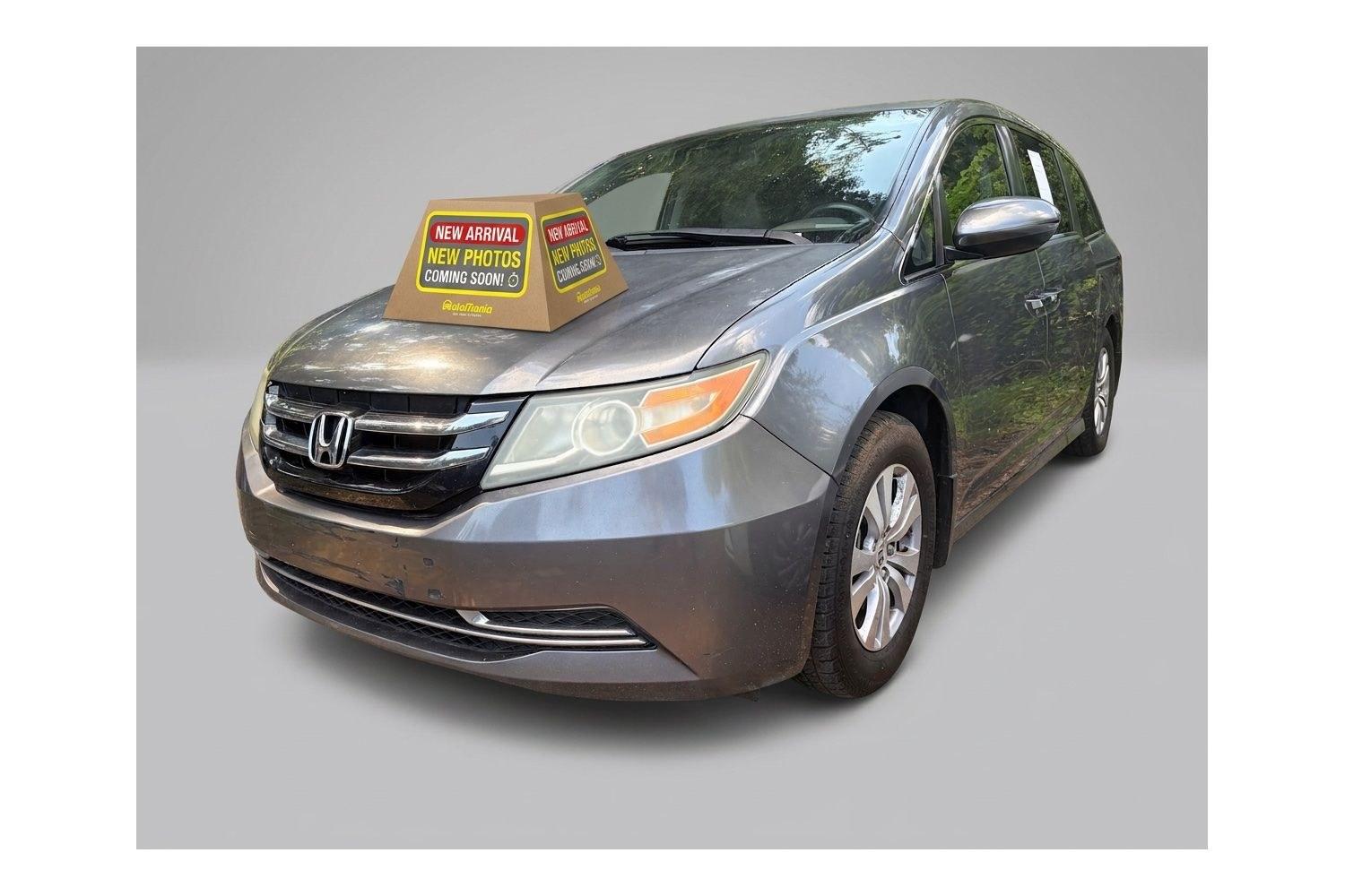 2014 Gray Honda Odyssey EX-L (5FNRL5H60EB) with an 3.5L V-6 i-VTEC variable valve control engine, located at 1806 Veterans Memorial Hwy SW, Austell, GA, 30168, (770) 944-9558, 33.817959, -84.606987- Photo#0