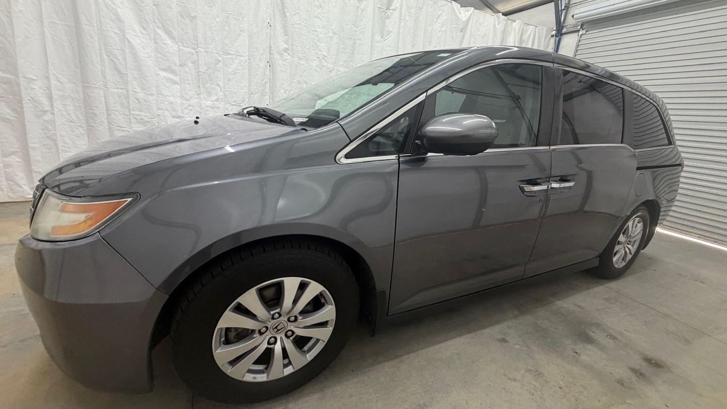 2014 Gray Honda Odyssey EX-L (5FNRL5H60EB) with an 3.5L V-6 i-VTEC variable valve control engine, located at 1806 Veterans Memorial Hwy SW, Austell, GA, 30168, (770) 944-9558, 33.817959, -84.606987 - Why Choose Automania? At Automania, we make car buying easy and stress-free, with over 20 years serving Austell, GA and the surrounding communities. WE FINANCE GOOD AND NOT SO GOOD CREDIT, we work with all credit types, and every vehicle comes with a free vehicle history report so you know its backg- Photo#1