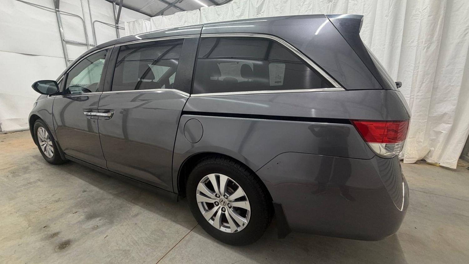 2014 Gray Honda Odyssey EX-L (5FNRL5H60EB) with an 3.5L V-6 i-VTEC variable valve control engine, located at 1806 Veterans Memorial Hwy SW, Austell, GA, 30168, (770) 944-9558, 33.817959, -84.606987 - Why Choose Automania? At Automania, we make car buying easy and stress-free, with over 20 years serving Austell, GA and the surrounding communities. WE FINANCE GOOD AND NOT SO GOOD CREDIT, we work with all credit types, and every vehicle comes with a free vehicle history report so you know its backg- Photo#2