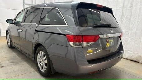 2014 Gray Honda Odyssey EX-L (5FNRL5H60EB) with an 3.5L V-6 i-VTEC variable valve control engine, located at 1806 Veterans Memorial Hwy SW, Austell, GA, 30168, (770) 944-9558, 33.817959, -84.606987 - Why Choose Automania? At Automania, we make car buying easy and stress-free, with over 20 years serving Austell, GA and the surrounding communities. WE FINANCE GOOD AND NOT SO GOOD CREDIT, we work with all credit types, and every vehicle comes with a free vehicle history report so you know its backg- Photo#3