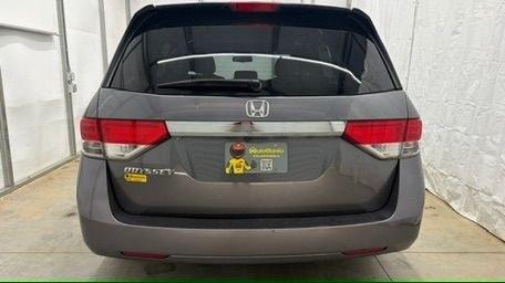 2014 Gray Honda Odyssey EX-L (5FNRL5H60EB) with an 3.5L V-6 i-VTEC variable valve control engine, located at 1806 Veterans Memorial Hwy SW, Austell, GA, 30168, (770) 944-9558, 33.817959, -84.606987 - Why Choose Automania? At Automania, we make car buying easy and stress-free, with over 20 years serving Austell, GA and the surrounding communities. WE FINANCE GOOD AND NOT SO GOOD CREDIT, we work with all credit types, and every vehicle comes with a free vehicle history report so you know its backg- Photo#4