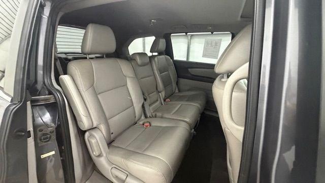 2014 Gray Honda Odyssey EX-L (5FNRL5H60EB) with an 3.5L V-6 i-VTEC variable valve control engine, located at 1806 Veterans Memorial Hwy SW, Austell, GA, 30168, (770) 944-9558, 33.817959, -84.606987 - Why Choose Automania? At Automania, we make car buying easy and stress-free, with over 20 years serving Austell, GA and the surrounding communities. WE FINANCE GOOD AND NOT SO GOOD CREDIT, we work with all credit types, and every vehicle comes with a free vehicle history report so you know its backg- Photo#17