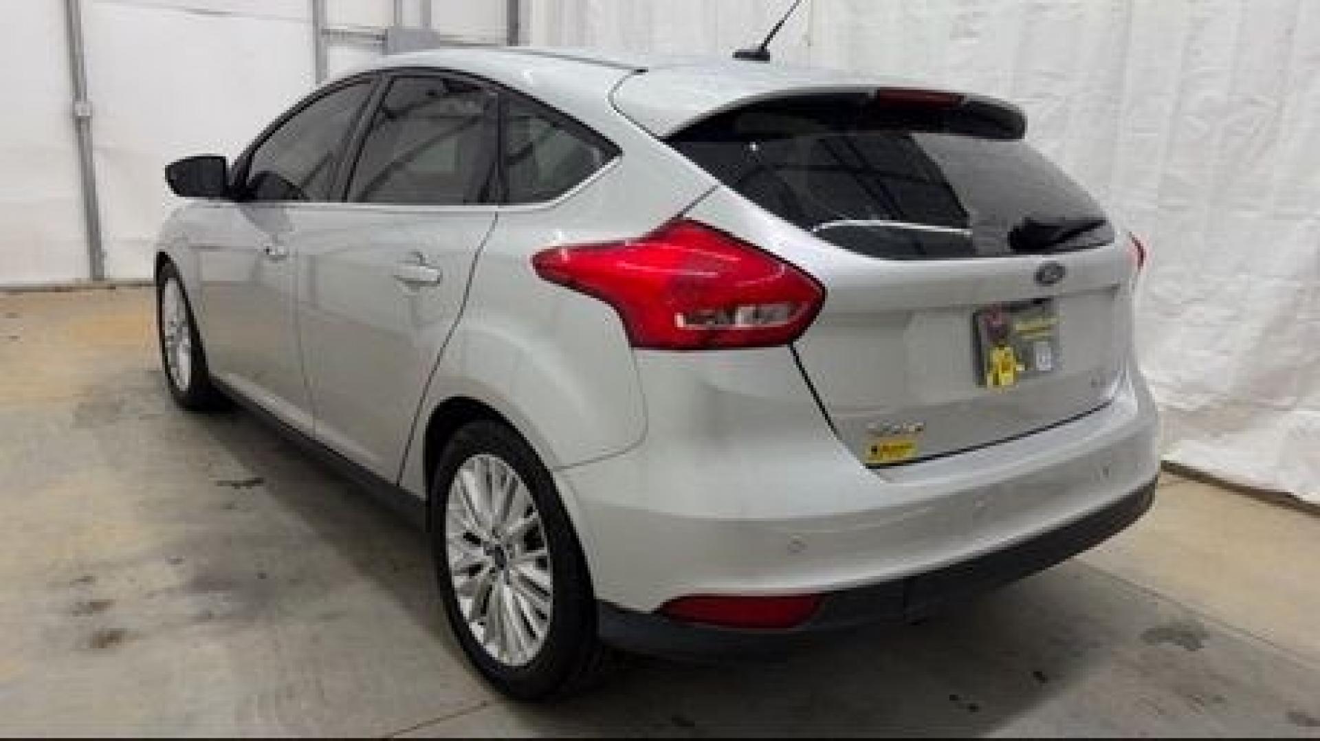 2018 Silver Ford Focus Titanium (1FADP3N20JL) with an 2L I-4 gasoline direct injection engine, located at 1806 Veterans Memorial Hwy SW, Austell, GA, 30168, (770) 944-9558, 33.817959, -84.606987- Photo#3