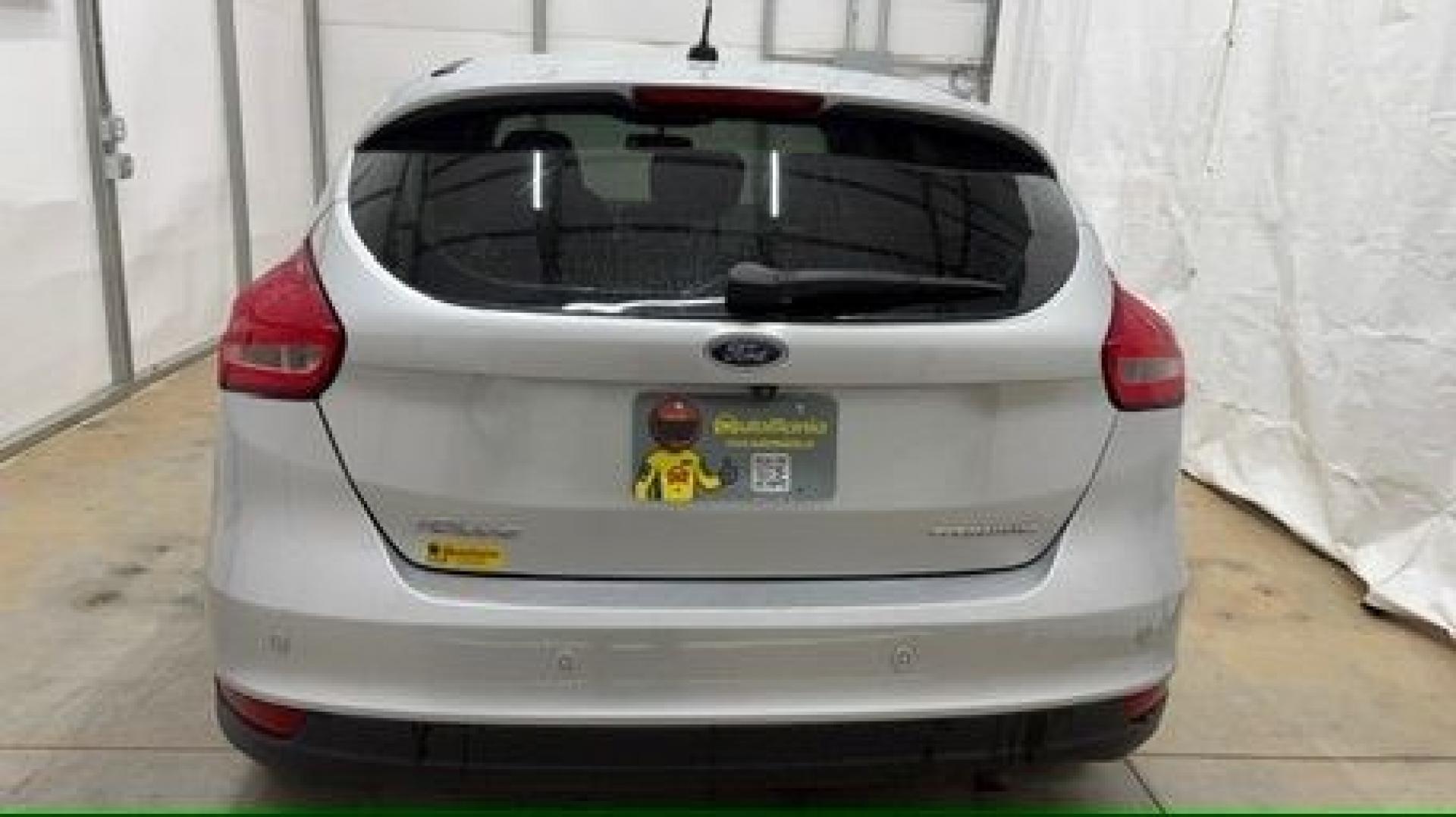 2018 Silver Ford Focus Titanium (1FADP3N20JL) with an 2L I-4 gasoline direct injection engine, located at 1806 Veterans Memorial Hwy SW, Austell, GA, 30168, (770) 944-9558, 33.817959, -84.606987- Photo#4
