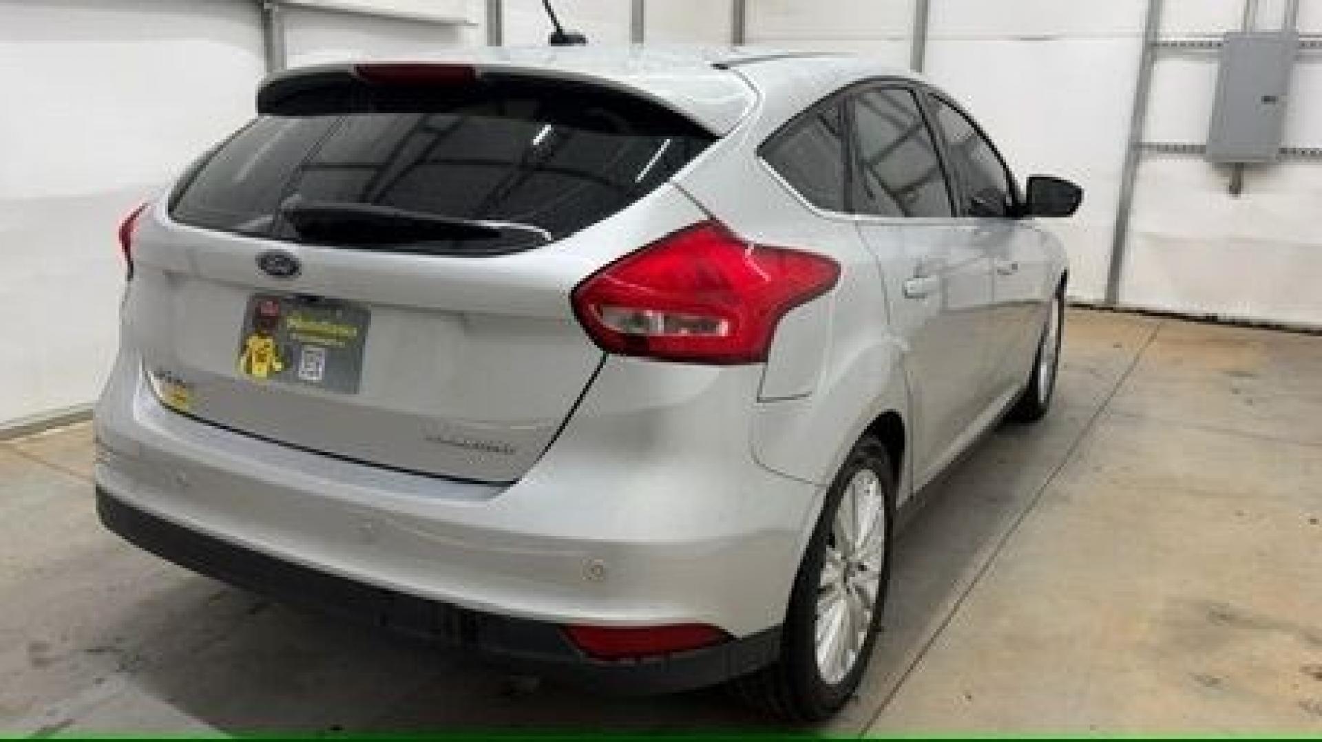 2018 Silver Ford Focus Titanium (1FADP3N20JL) with an 2L I-4 gasoline direct injection engine, located at 1806 Veterans Memorial Hwy SW, Austell, GA, 30168, (770) 944-9558, 33.817959, -84.606987- Photo#5