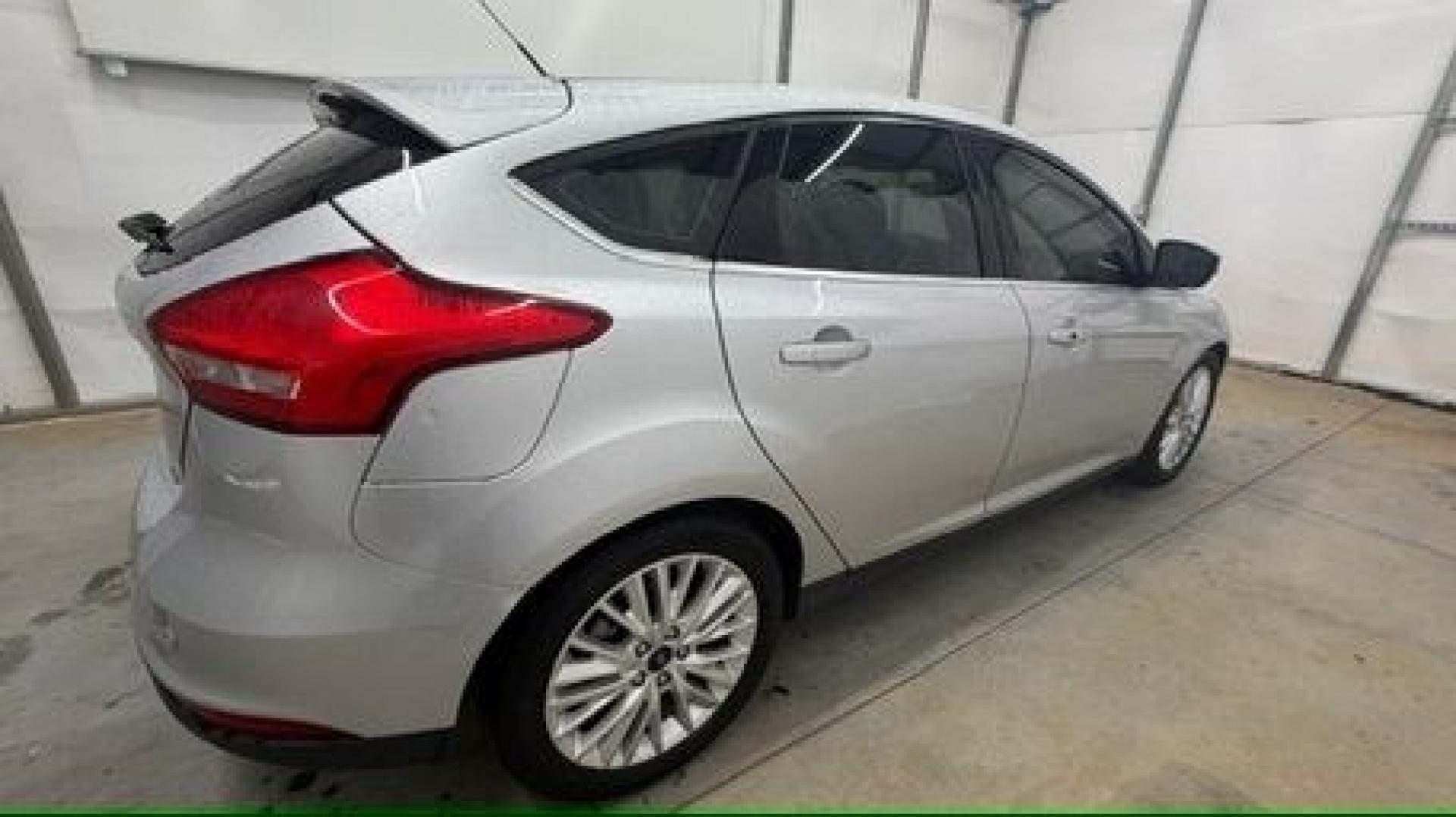 2018 Silver Ford Focus Titanium (1FADP3N20JL) with an 2L I-4 gasoline direct injection engine, located at 1806 Veterans Memorial Hwy SW, Austell, GA, 30168, (770) 944-9558, 33.817959, -84.606987- Photo#6