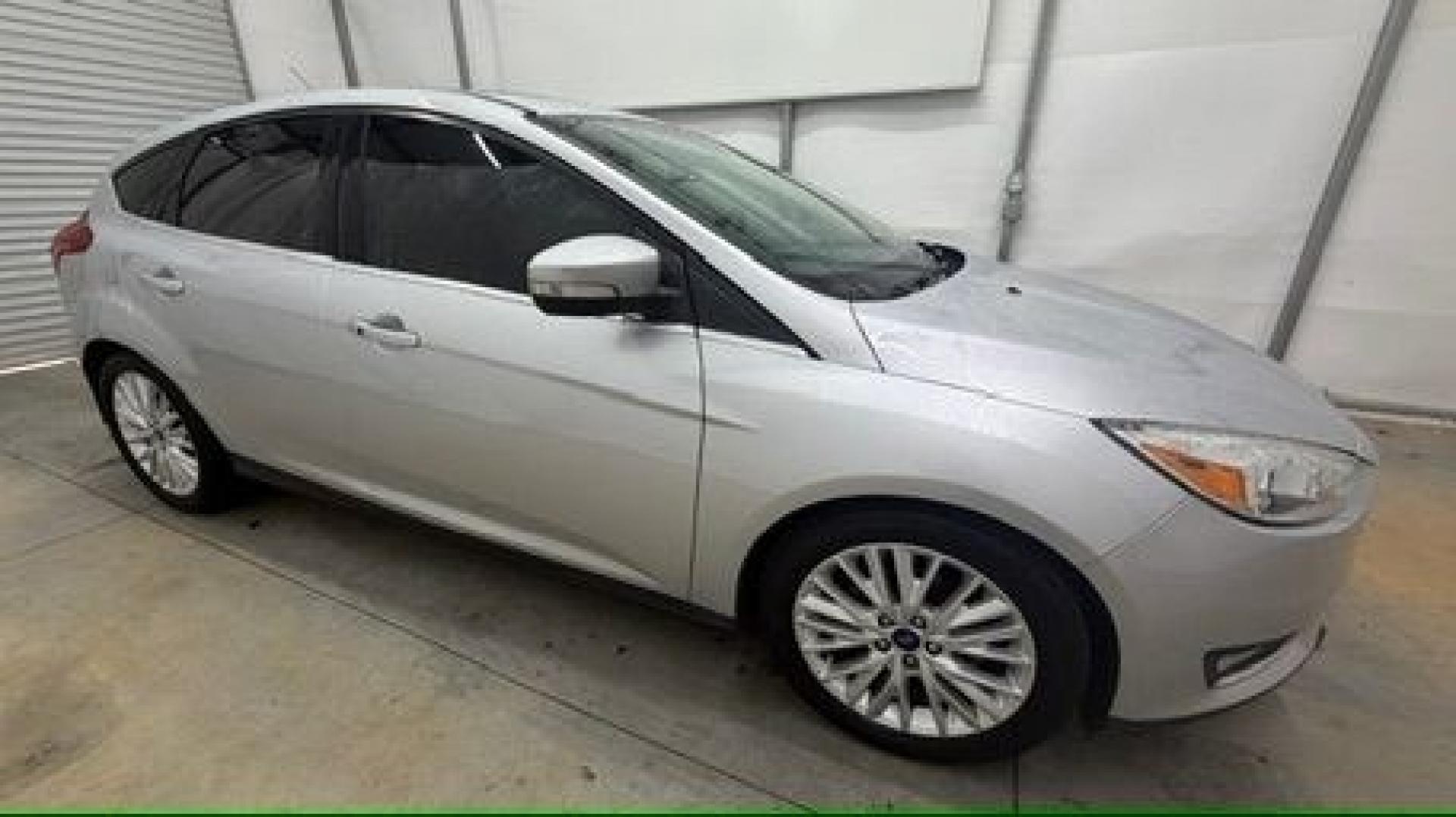 2018 Silver Ford Focus Titanium (1FADP3N20JL) with an 2L I-4 gasoline direct injection engine, located at 1806 Veterans Memorial Hwy SW, Austell, GA, 30168, (770) 944-9558, 33.817959, -84.606987- Photo#7