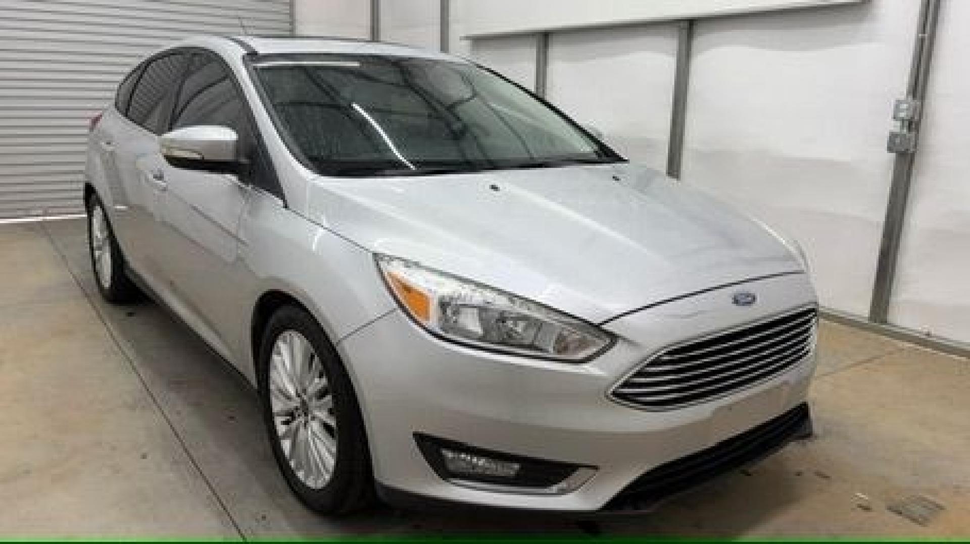 2018 Silver Ford Focus Titanium (1FADP3N20JL) with an 2L I-4 gasoline direct injection engine, located at 1806 Veterans Memorial Hwy SW, Austell, GA, 30168, (770) 944-9558, 33.817959, -84.606987- Photo#8