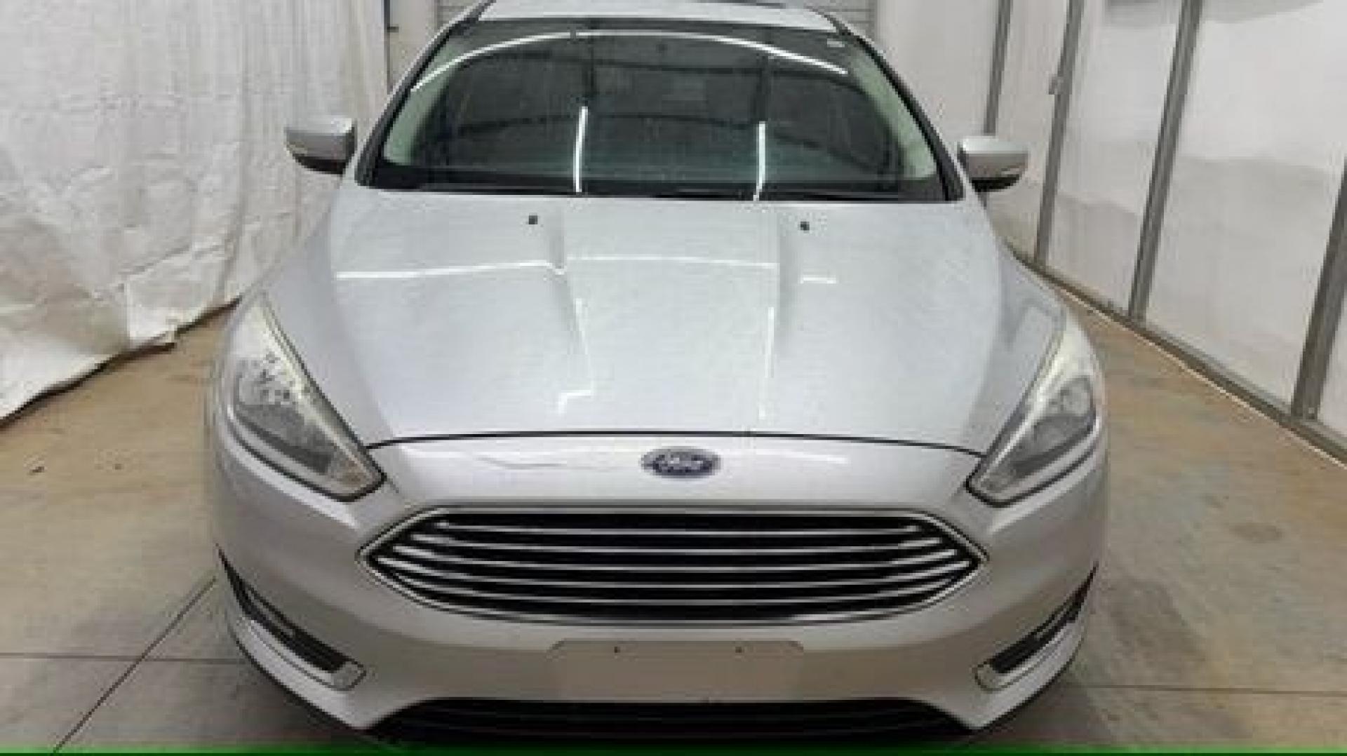 2018 Silver Ford Focus Titanium (1FADP3N20JL) with an 2L I-4 gasoline direct injection engine, located at 1806 Veterans Memorial Hwy SW, Austell, GA, 30168, (770) 944-9558, 33.817959, -84.606987- Photo#9